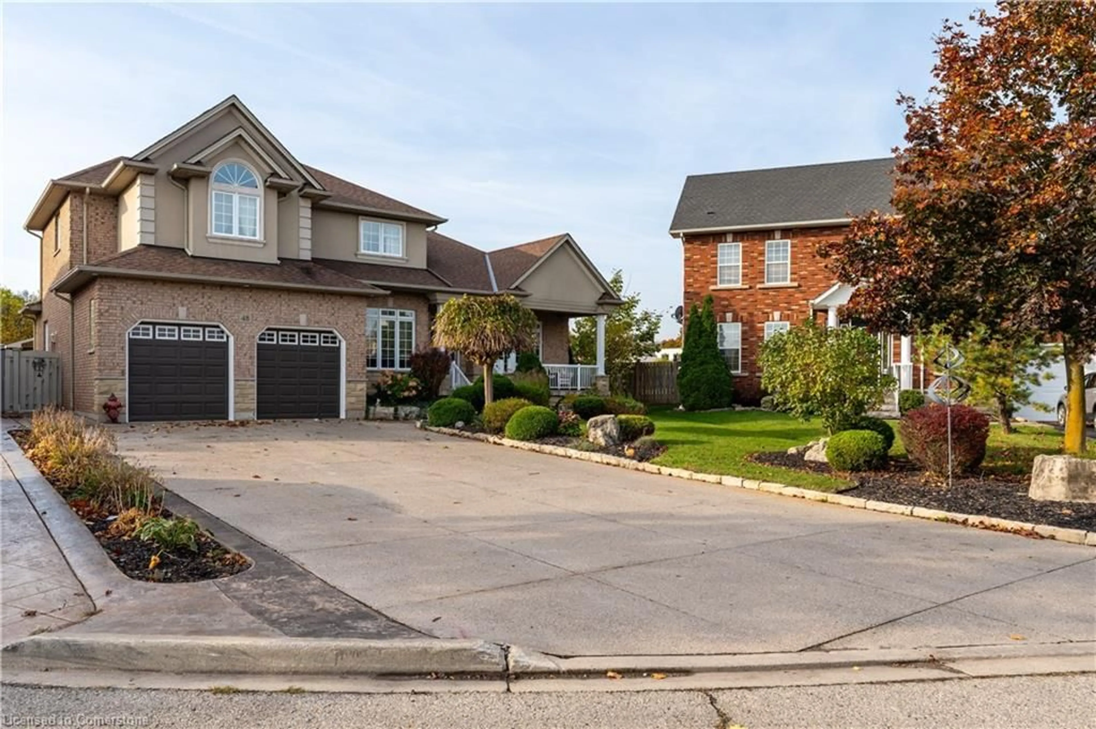Home with brick exterior material, street for 48 Tuscani Dr, Stoney Creek Ontario L8E 5W4