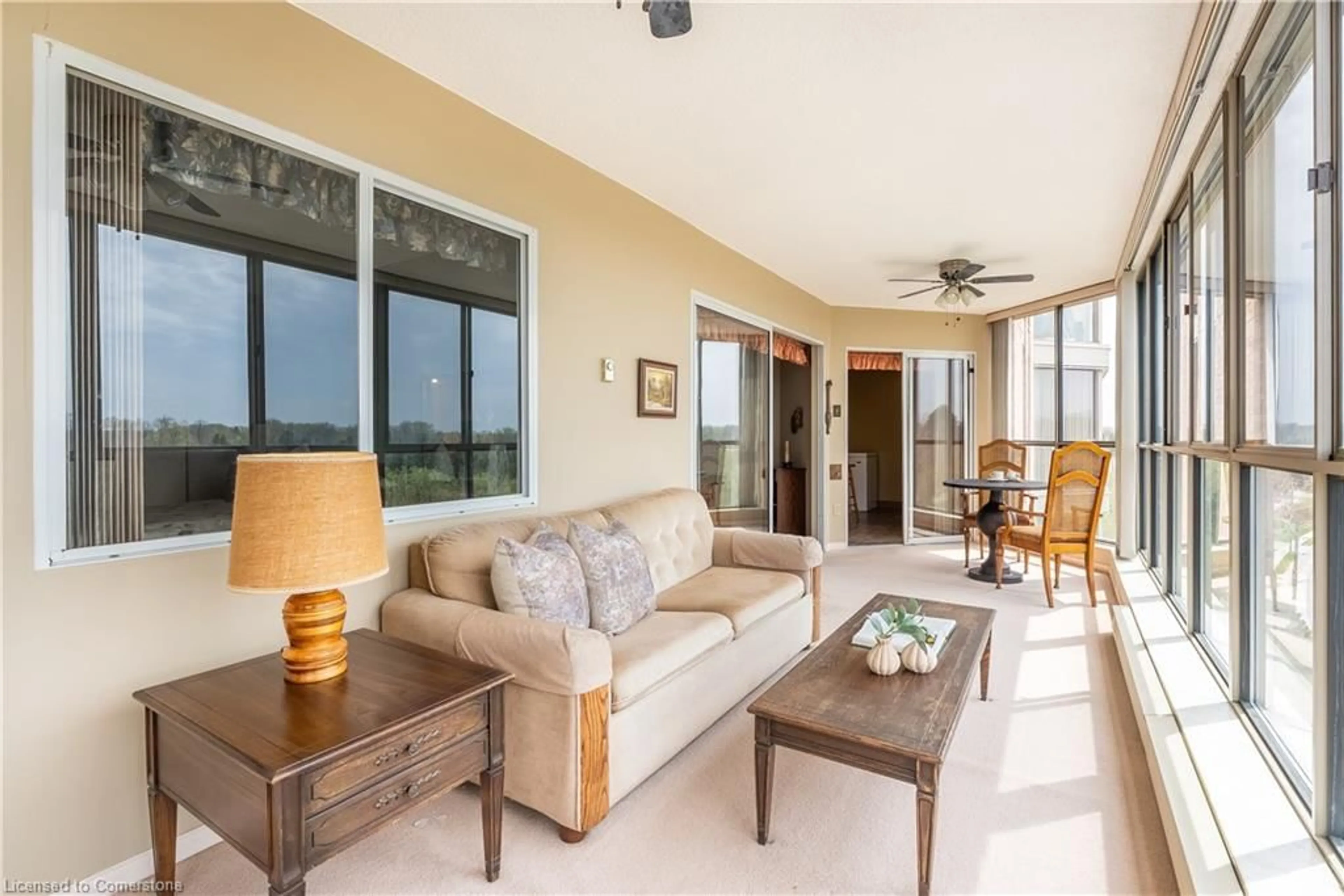 Living room with furniture, ceramic/tile floor for 265 Westcourt Pl #907, Waterloo Ontario N2L 6E4