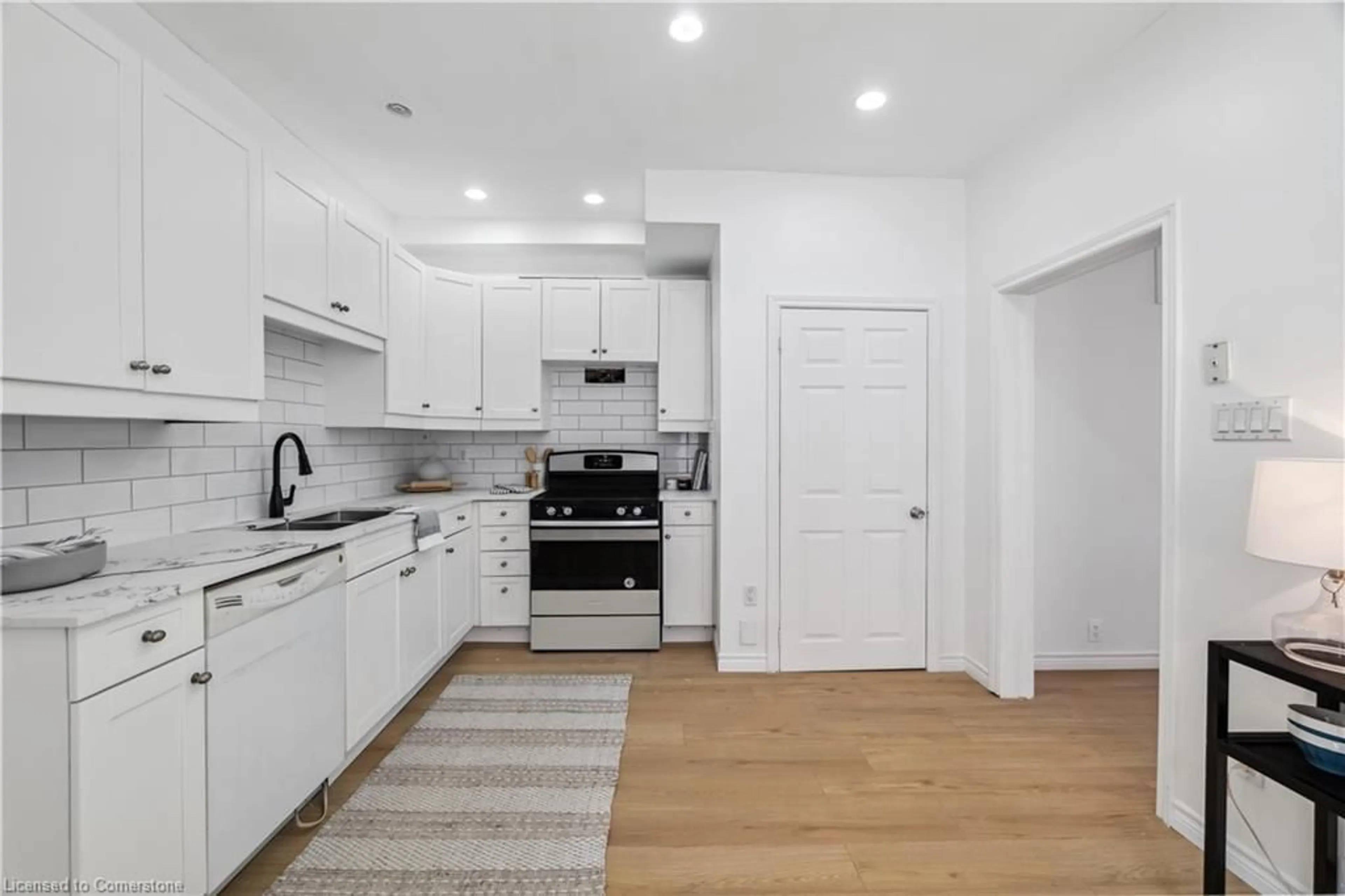Open concept kitchen, unknown for 49 1/2 Earl St, Hamilton Ontario L8L 6L1