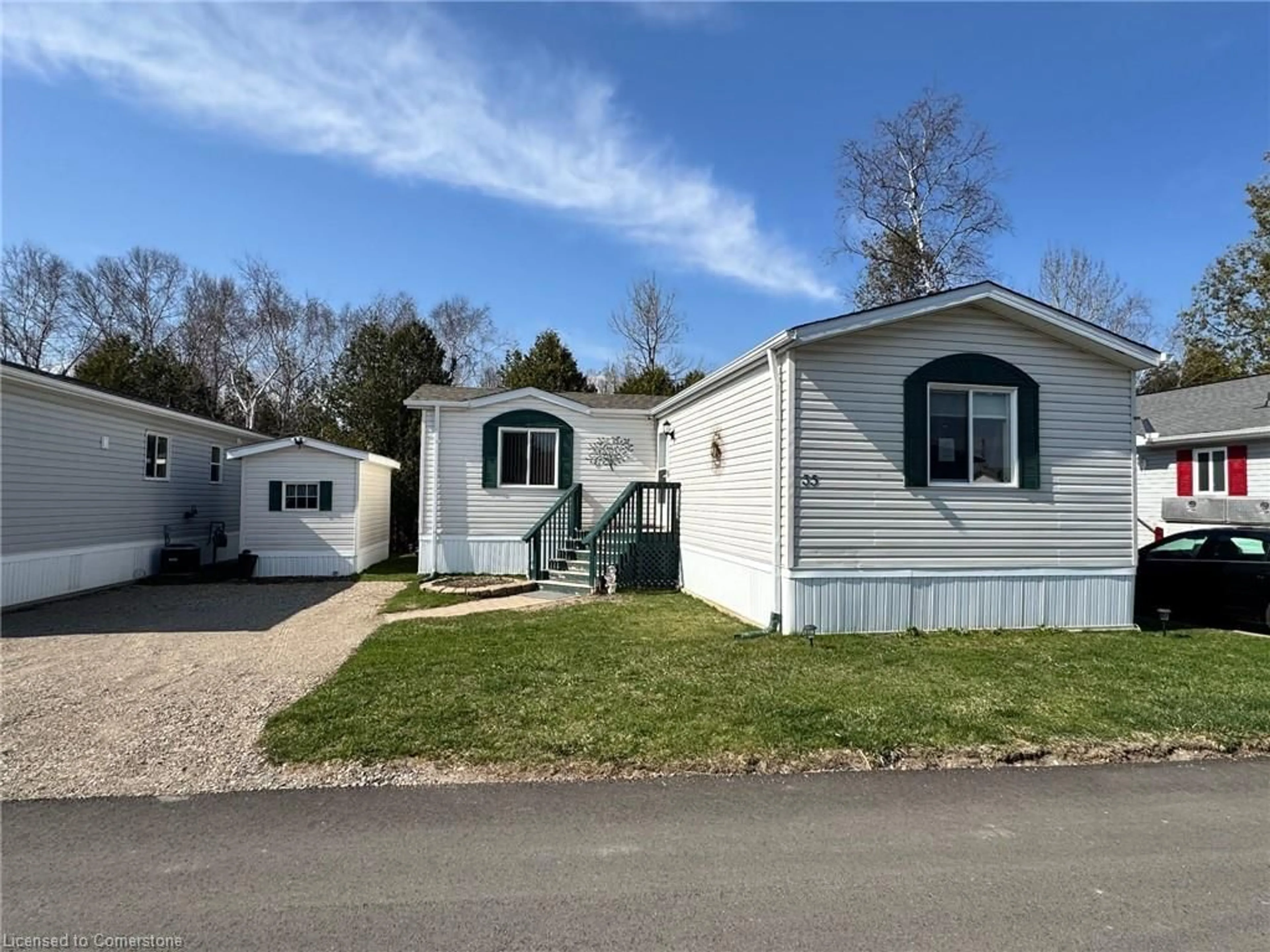 Home with vinyl exterior material, street for 35 Water St, Puslinch Ontario N0B 2J0