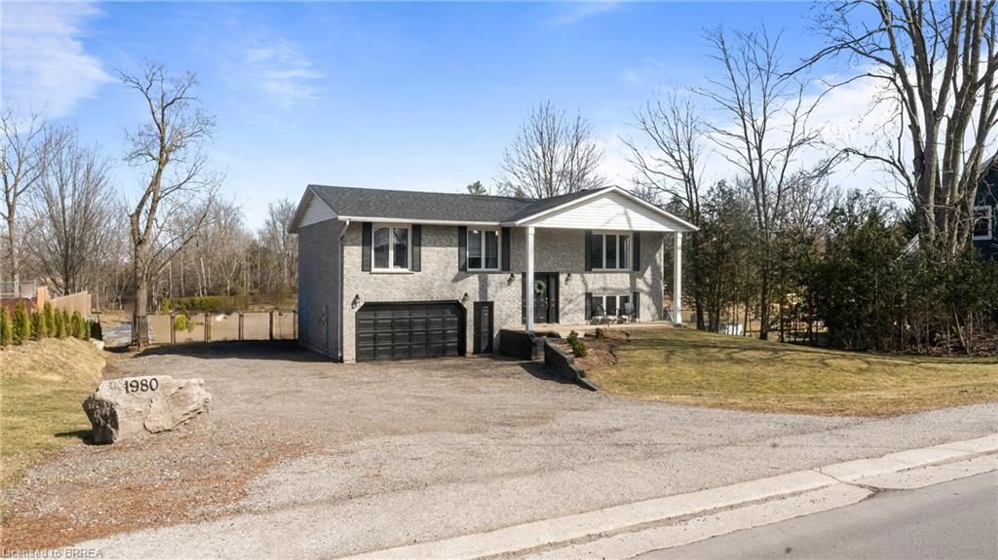 Home with vinyl exterior material, street for 1980 Old Highway 24, Wilsonville Ontario N0E 1Z0