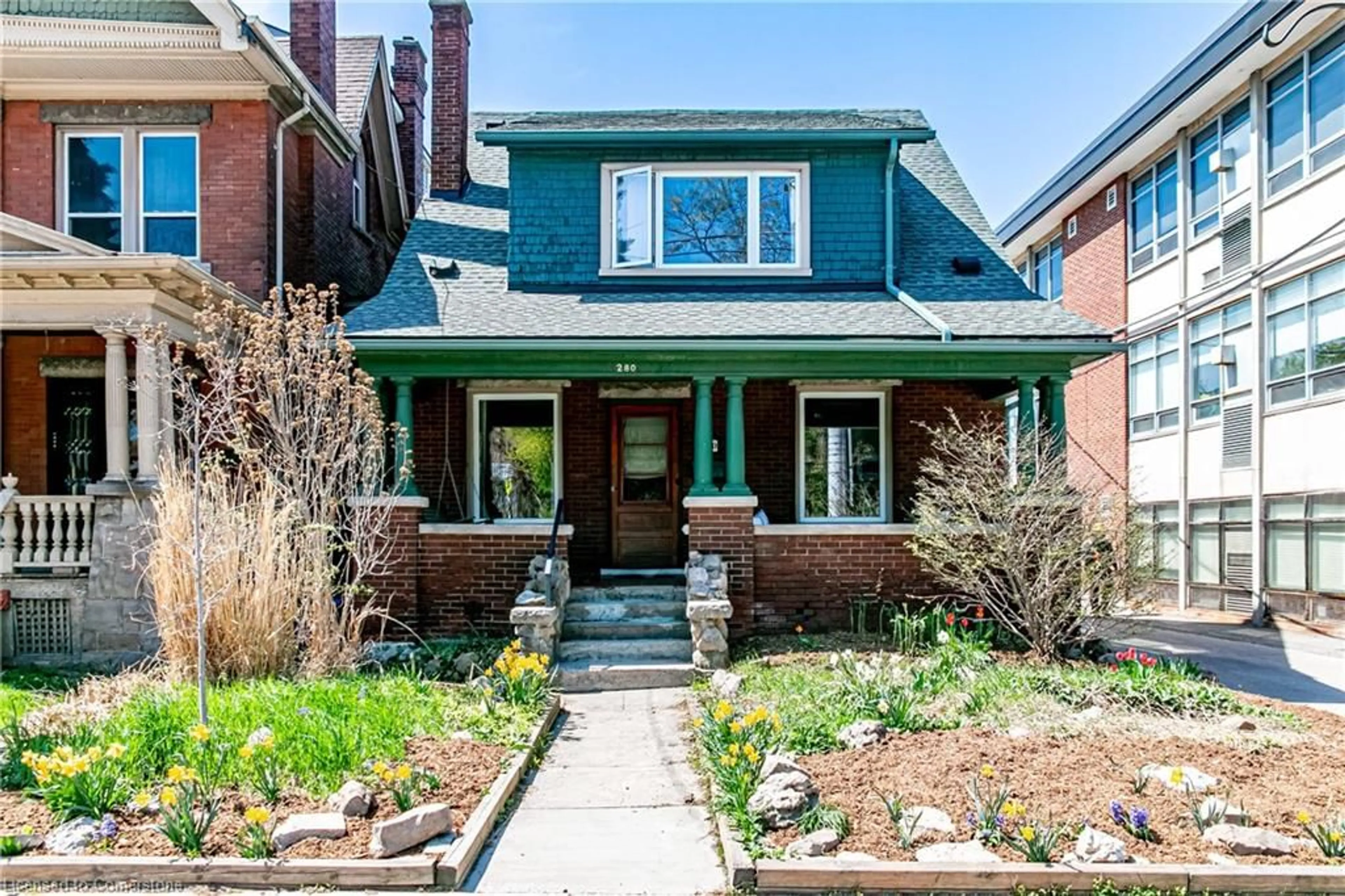 Home with brick exterior material, street for 280 Locke St, Hamilton Ontario L8P 4C1
