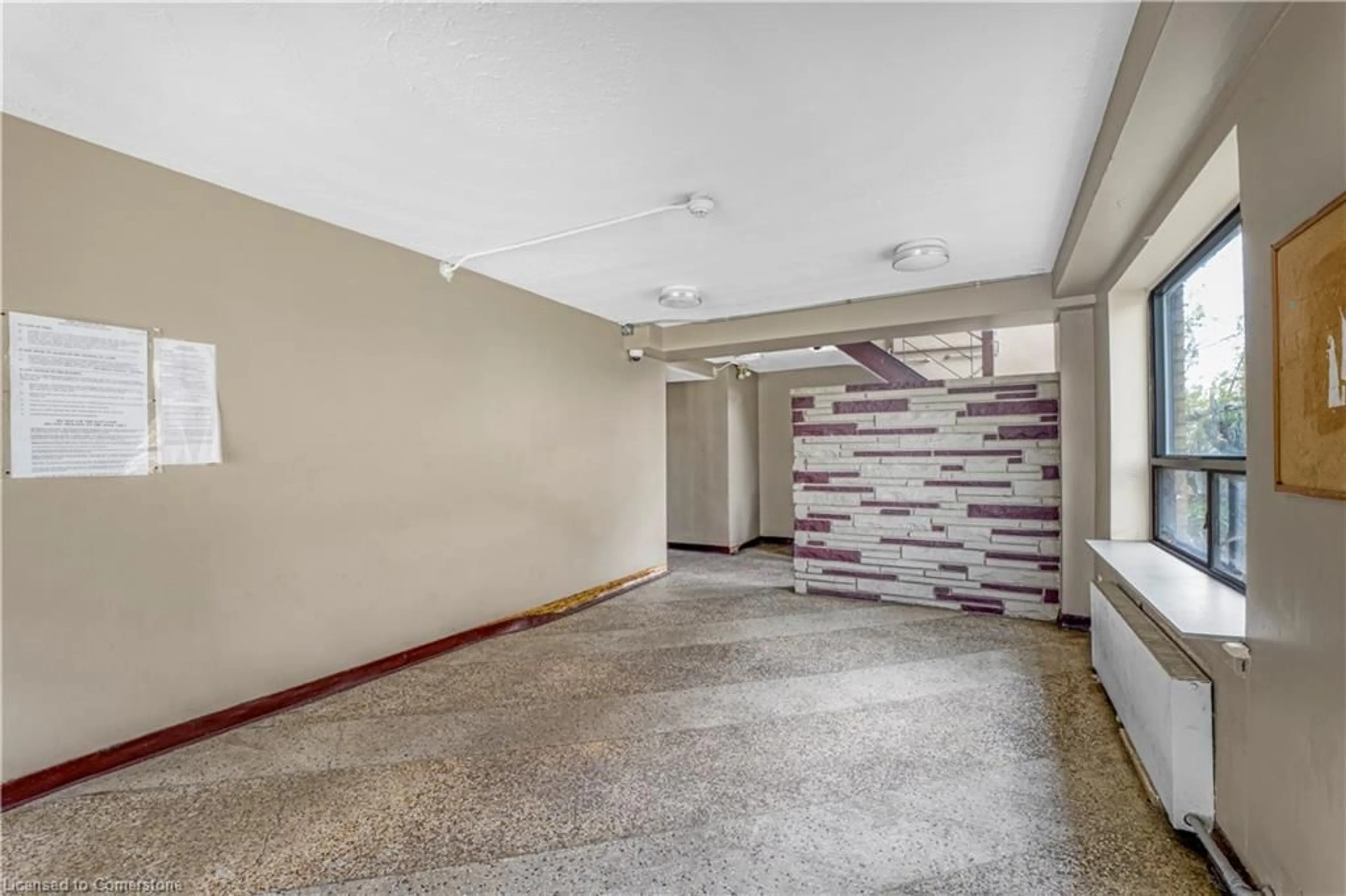 Indoor foyer for 295 Melvin Ave, Hamilton Ontario L8H 2K6