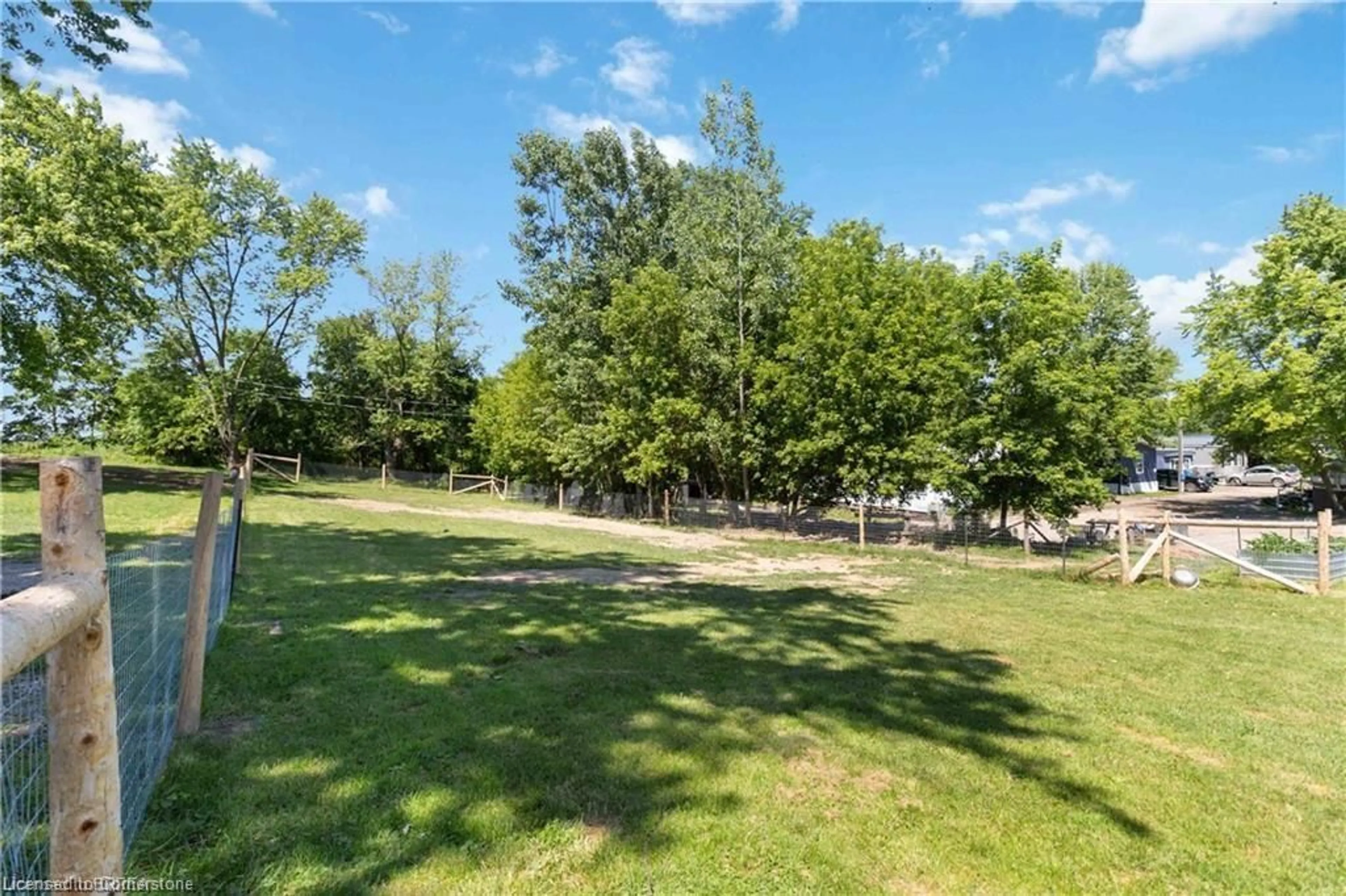A pic from outside/outdoor area/front of a property/back of a property/a pic from drone, forest/trees view for 99 Fourth Concession Rd #LOT 232, Burford Ontario N0E 1A0