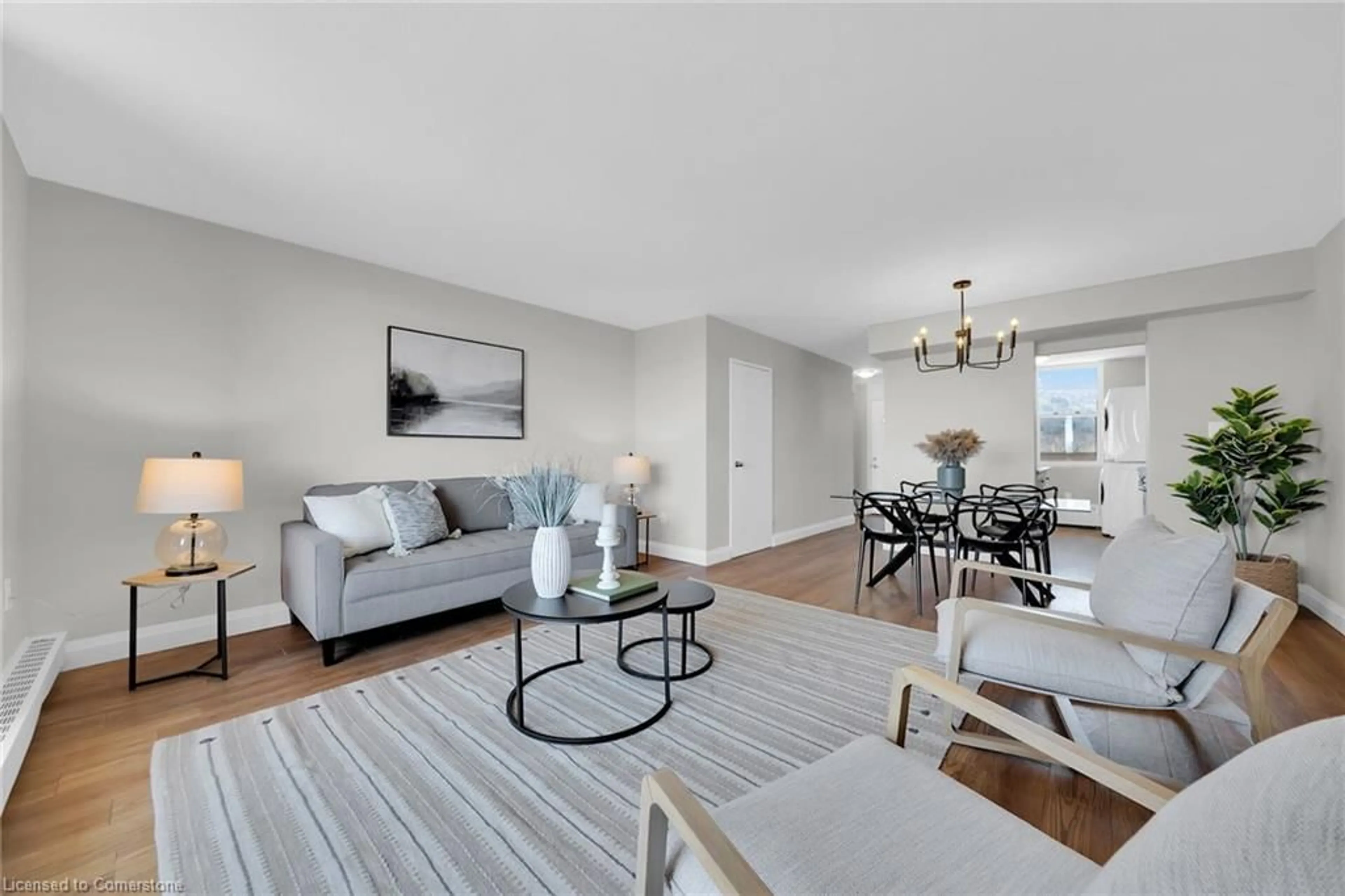 Living room with furniture, unknown for 350 Quigley Rd #424, Hamilton Ontario L8K 5N2