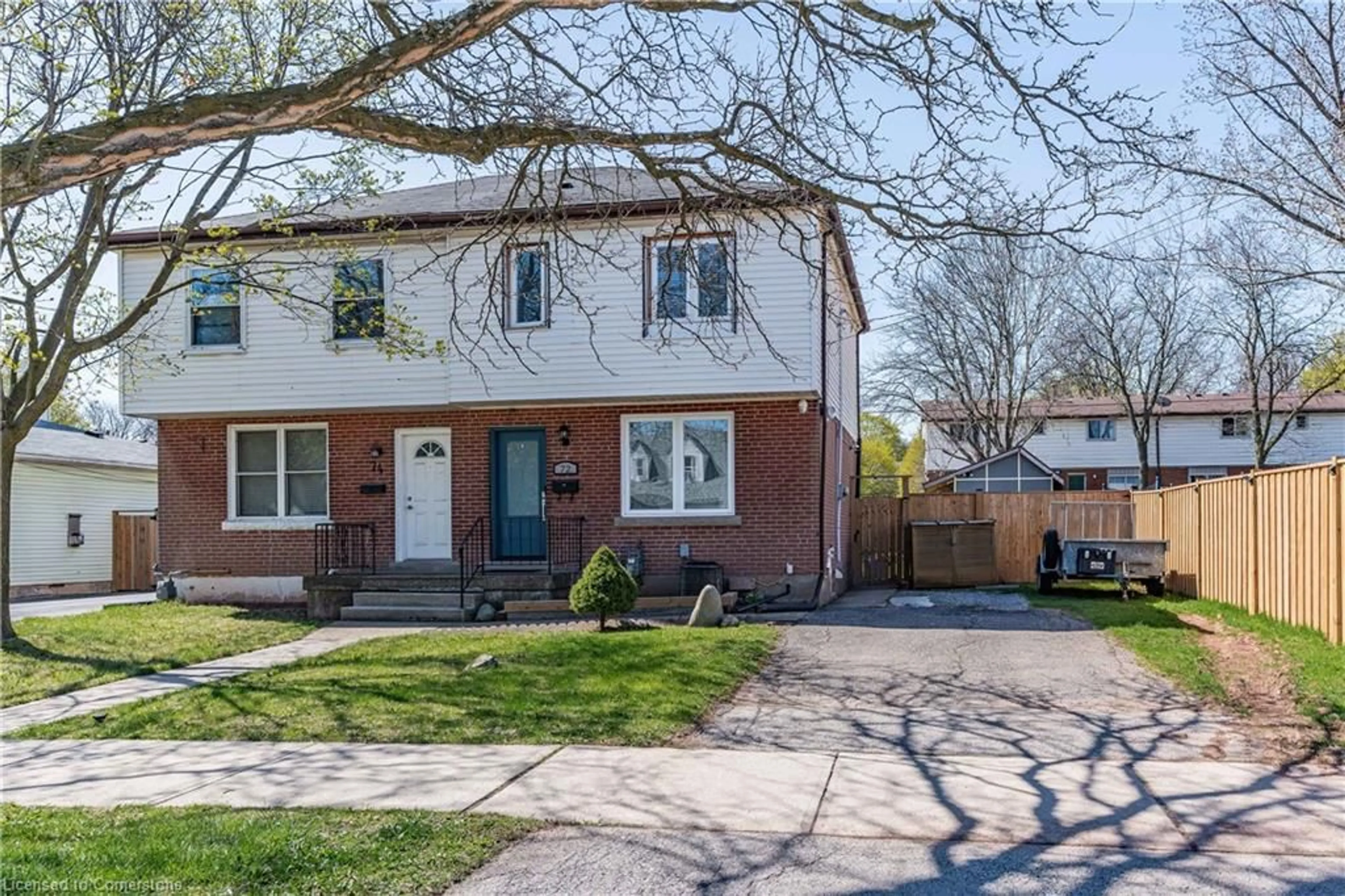 Home with brick exterior material, street for 72 Martha St, Hamilton Ontario L8H 2B7