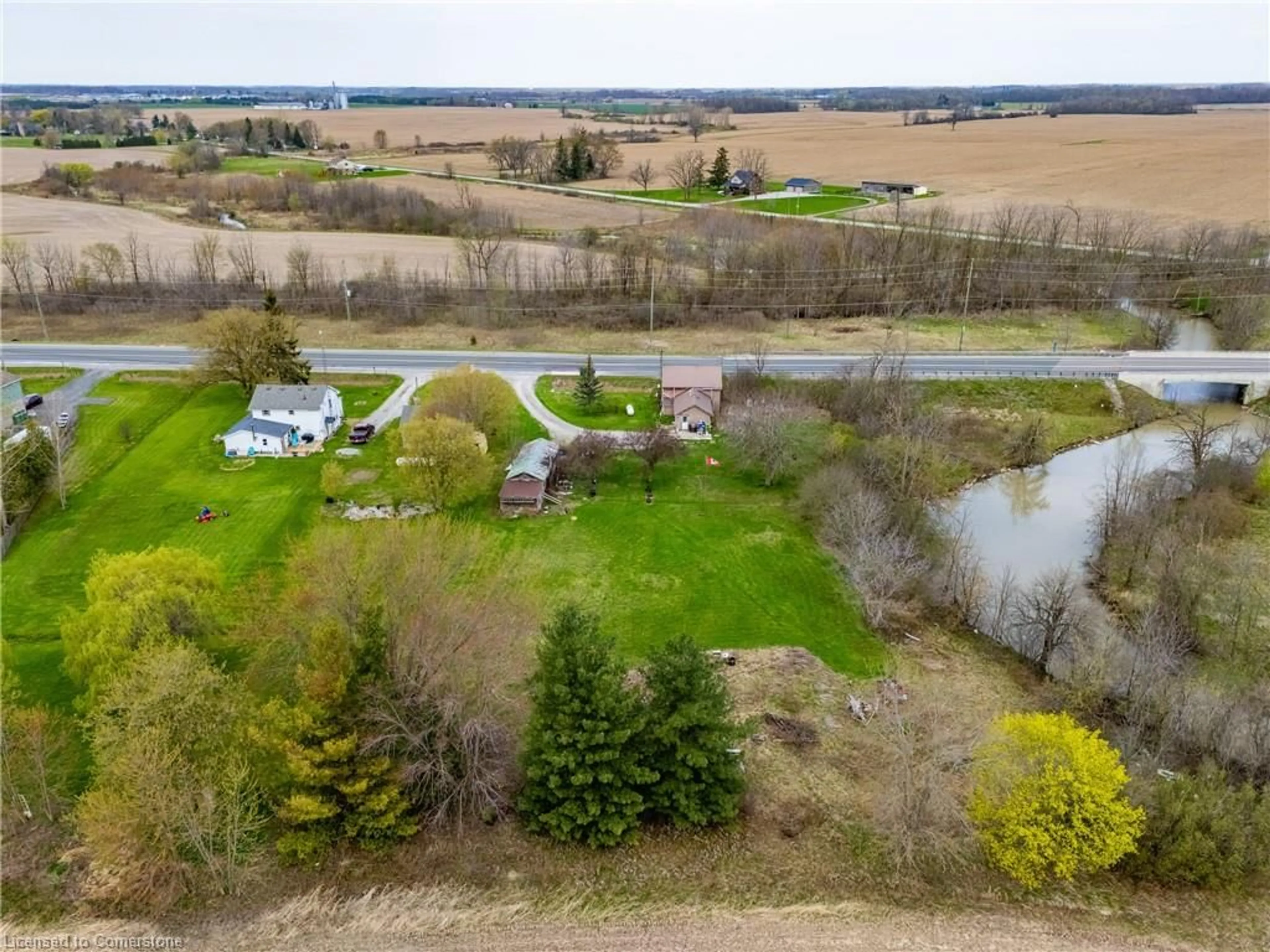 A pic from outside/outdoor area/front of a property/back of a property/a pic from drone, water/lake/river/ocean view for 3468 Highway 6, Hagersville Ontario N0A 1H0