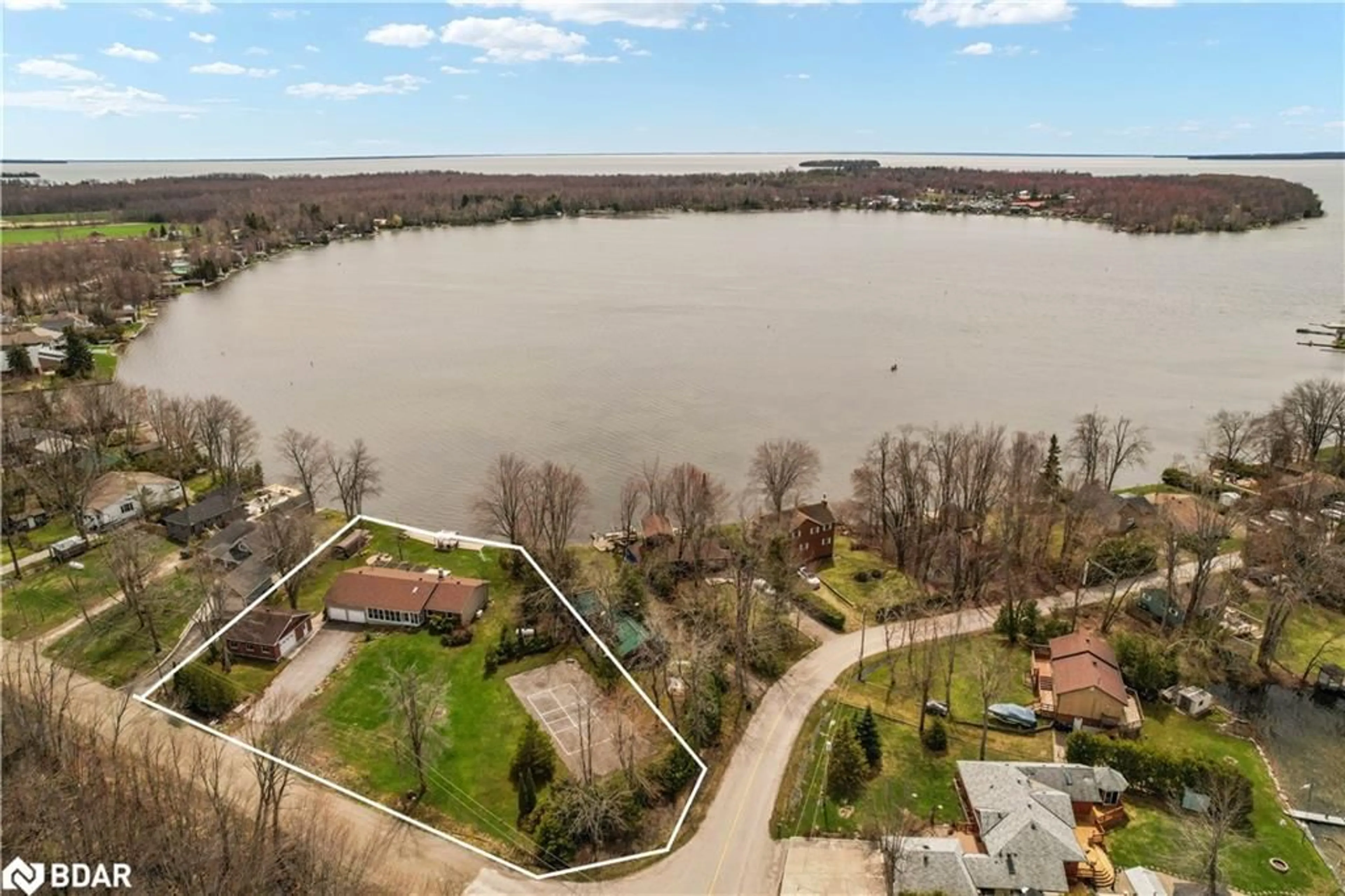 A pic from outside/outdoor area/front of a property/back of a property/a pic from drone, water/lake/river/ocean view for 4051 River Rd, Ramara Ontario L3V 6H7