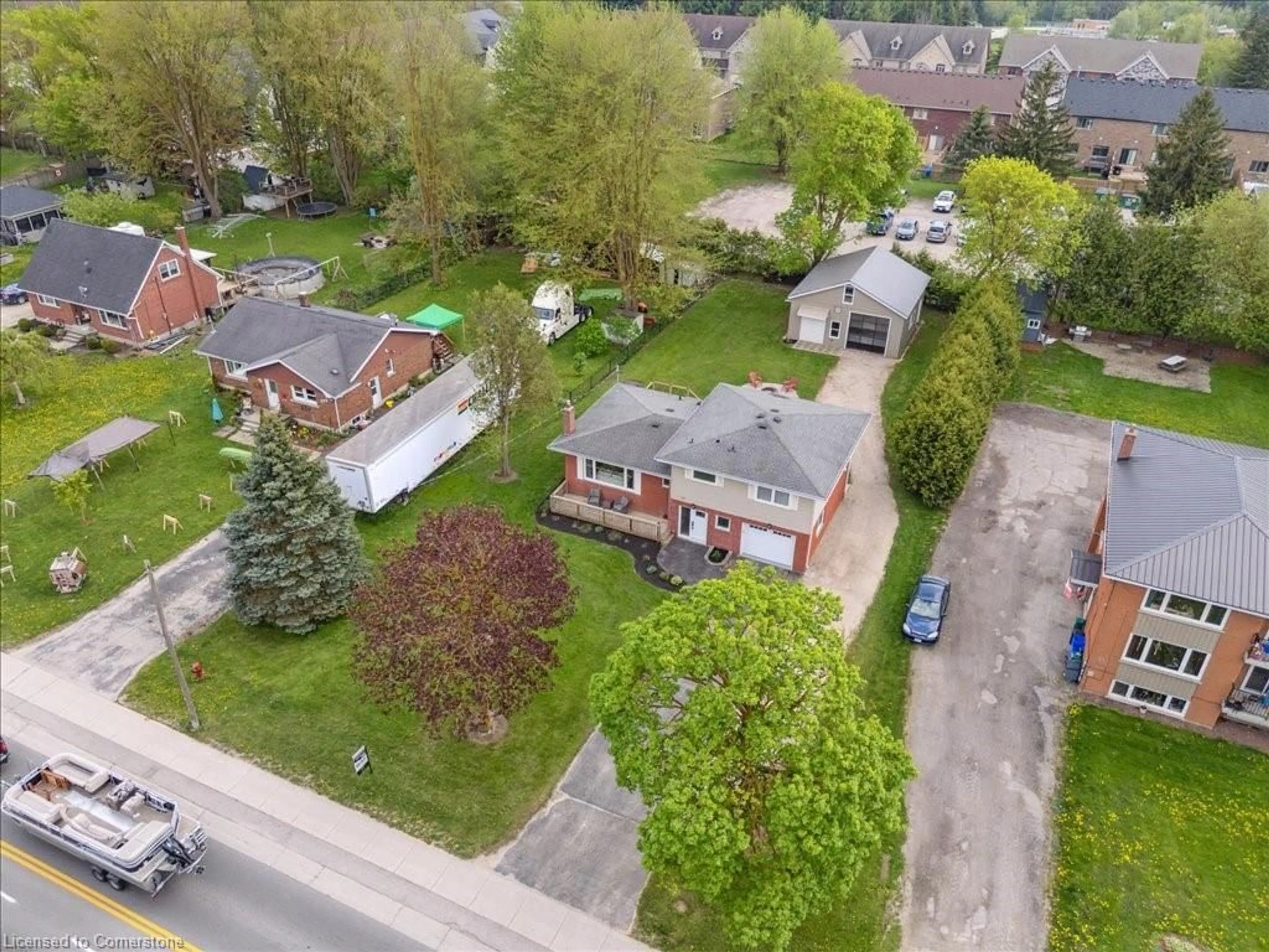 A pic from outside/outdoor area/front of a property/back of a property/a pic from drone, street for 381 Smith St, Arthur Ontario N0G 1A0