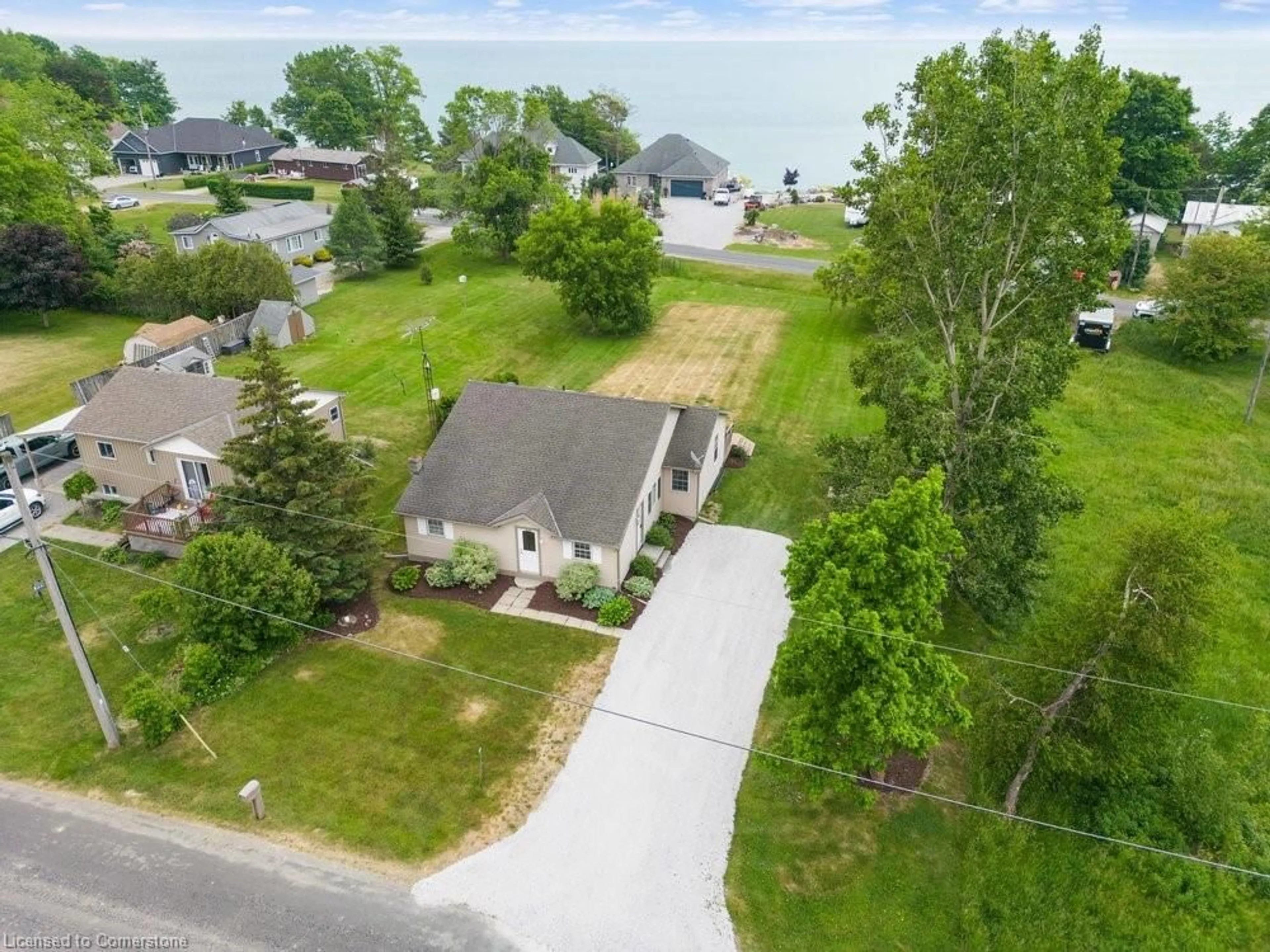 A pic from outside/outdoor area/front of a property/back of a property/a pic from drone, water/lake/river/ocean view for 30 Old Lakeshore Rd, Port Dover Ontario N0A 1N3