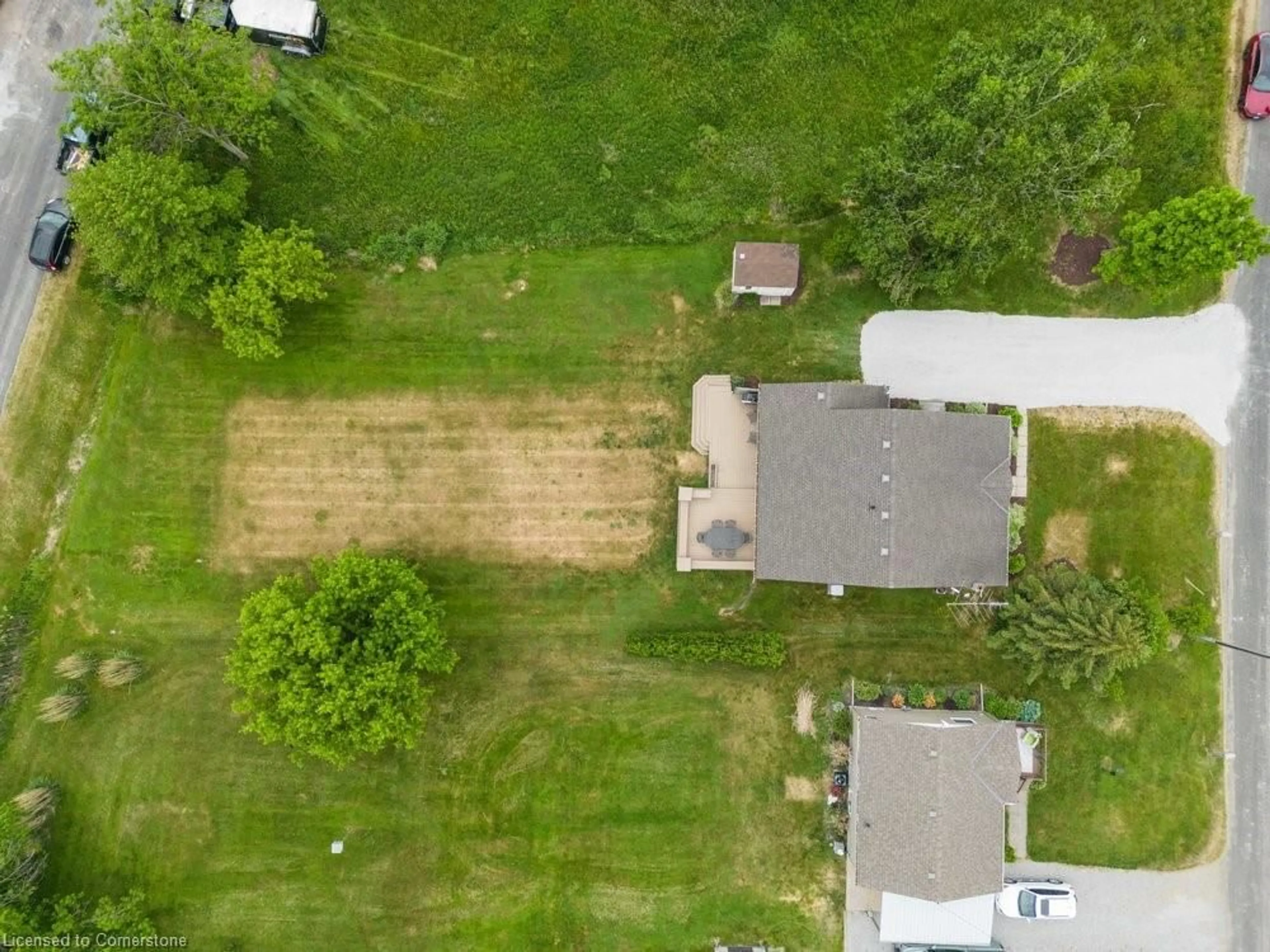 A pic from outside/outdoor area/front of a property/back of a property/a pic from drone, street for 30 Old Lakeshore Rd, Port Dover Ontario N0A 1N3