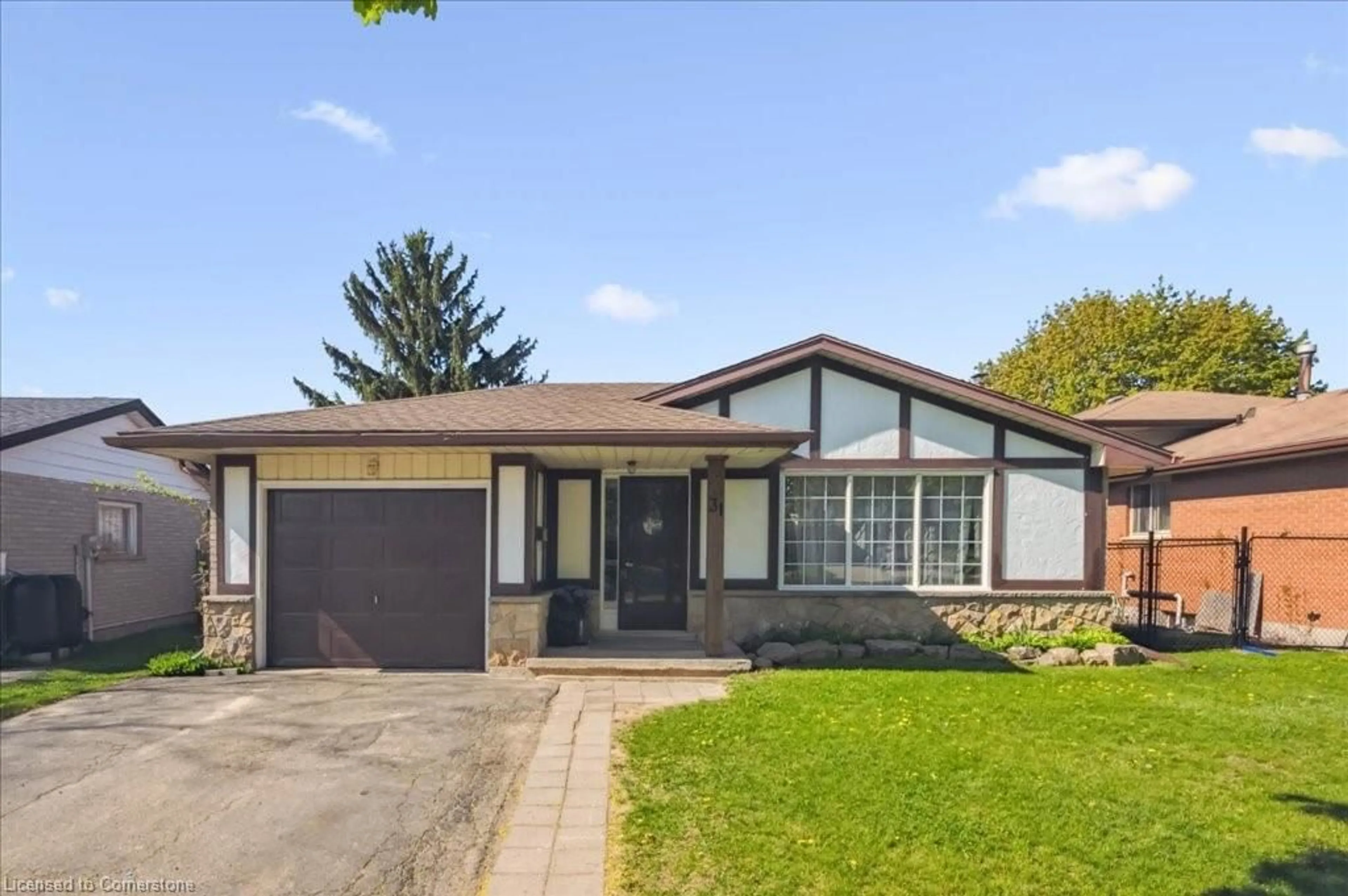 Home with vinyl exterior material, street for 31 Settlers Dr, Kitchener Ontario N2E 2L7