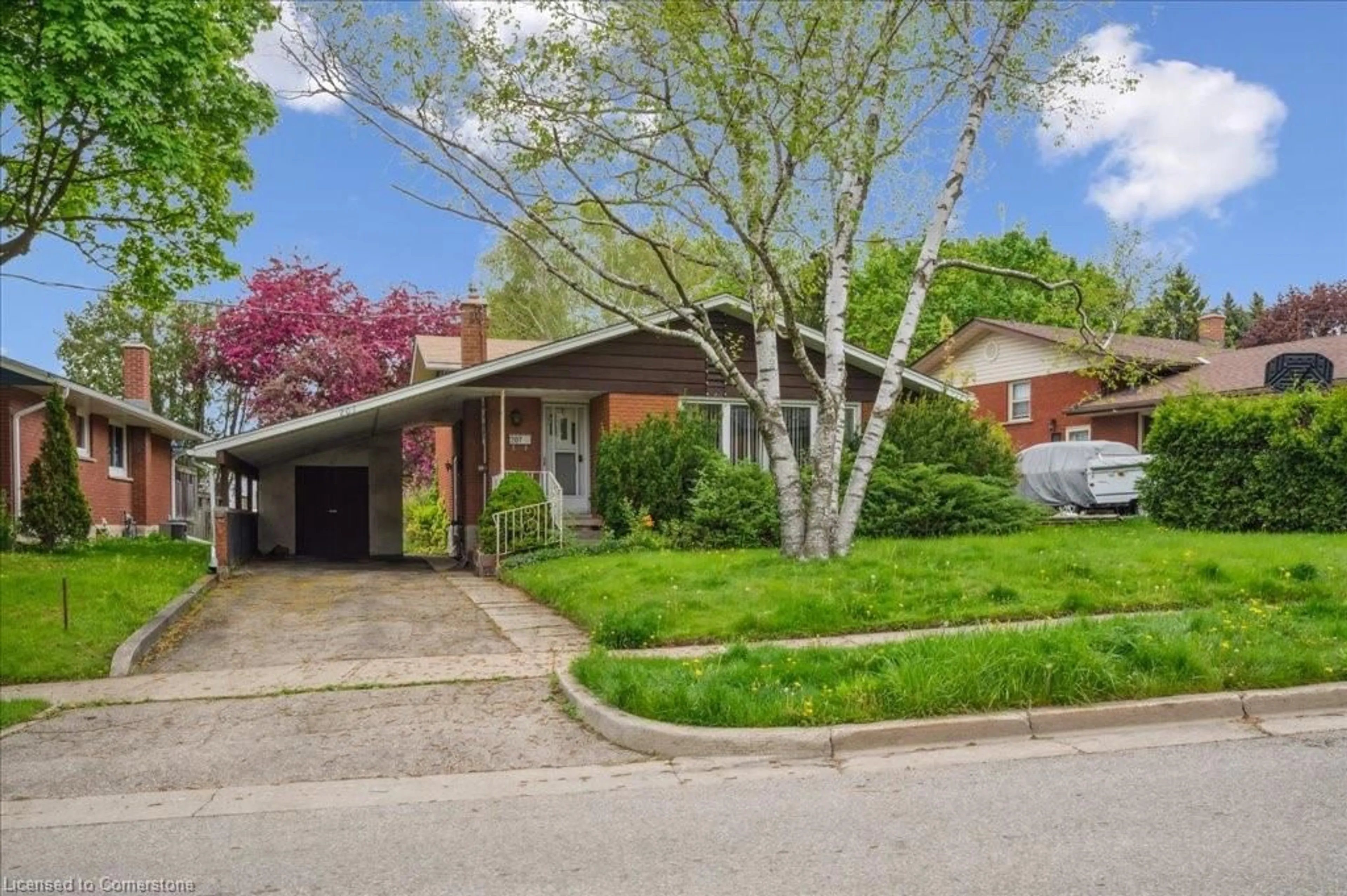 Home with brick exterior material, street for 207 Sweetbriar Dr, Kitchener Ontario N2M 4S9