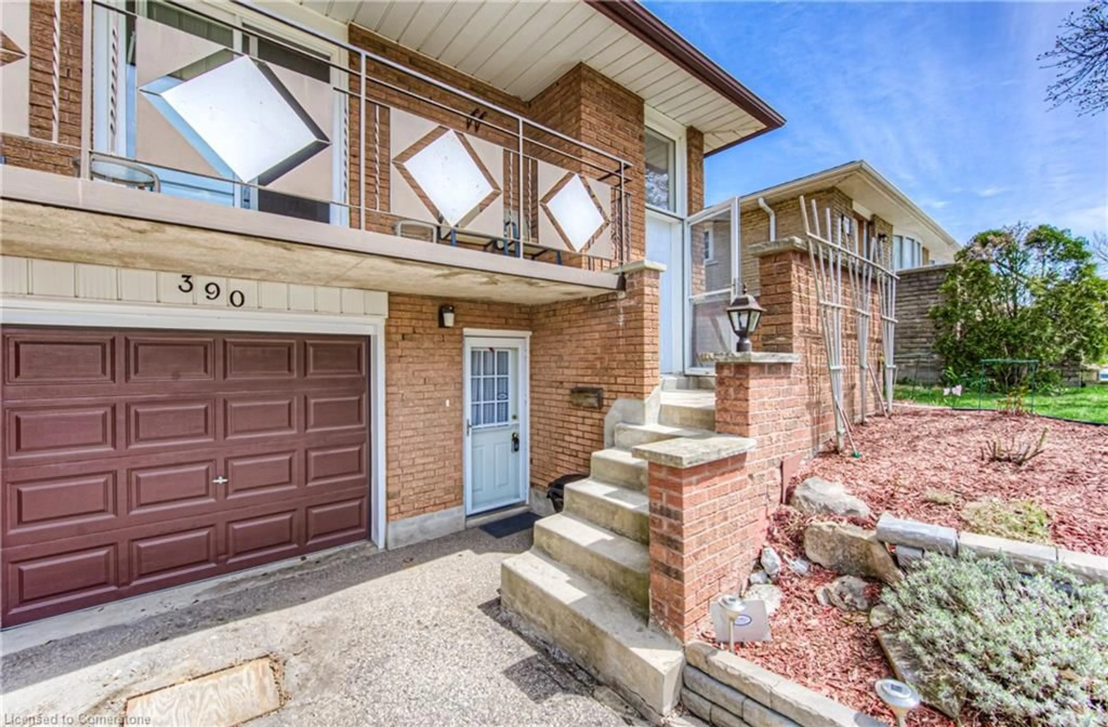 Home with brick exterior material, street for 390 Westwood Dr, Kitchener Ontario N2M 2L6