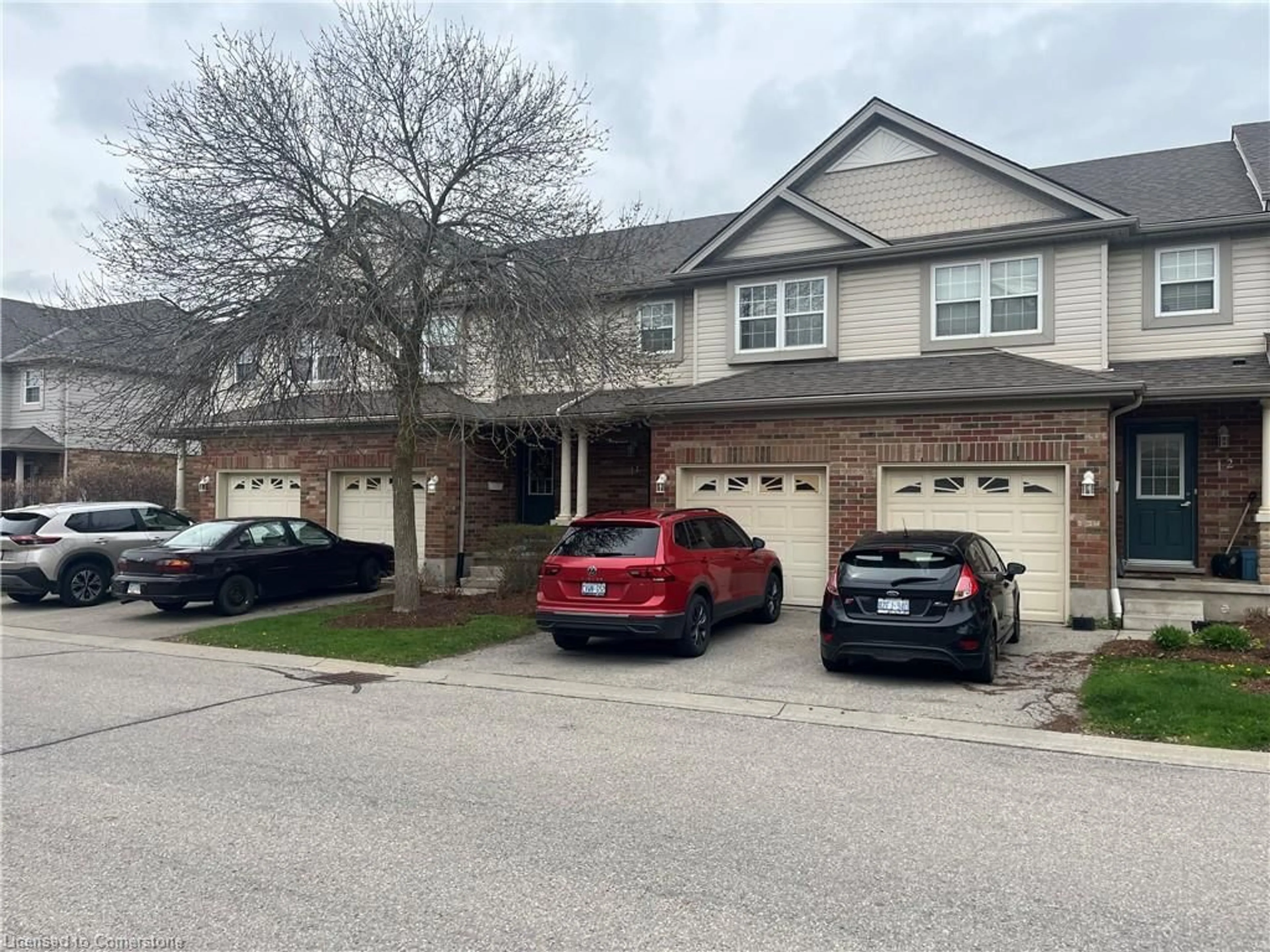 A pic from outside/outdoor area/front of a property/back of a property/a pic from drone, street for 30 Imperial Rd S Rd #11, Guelph Ontario N1K 1Y2