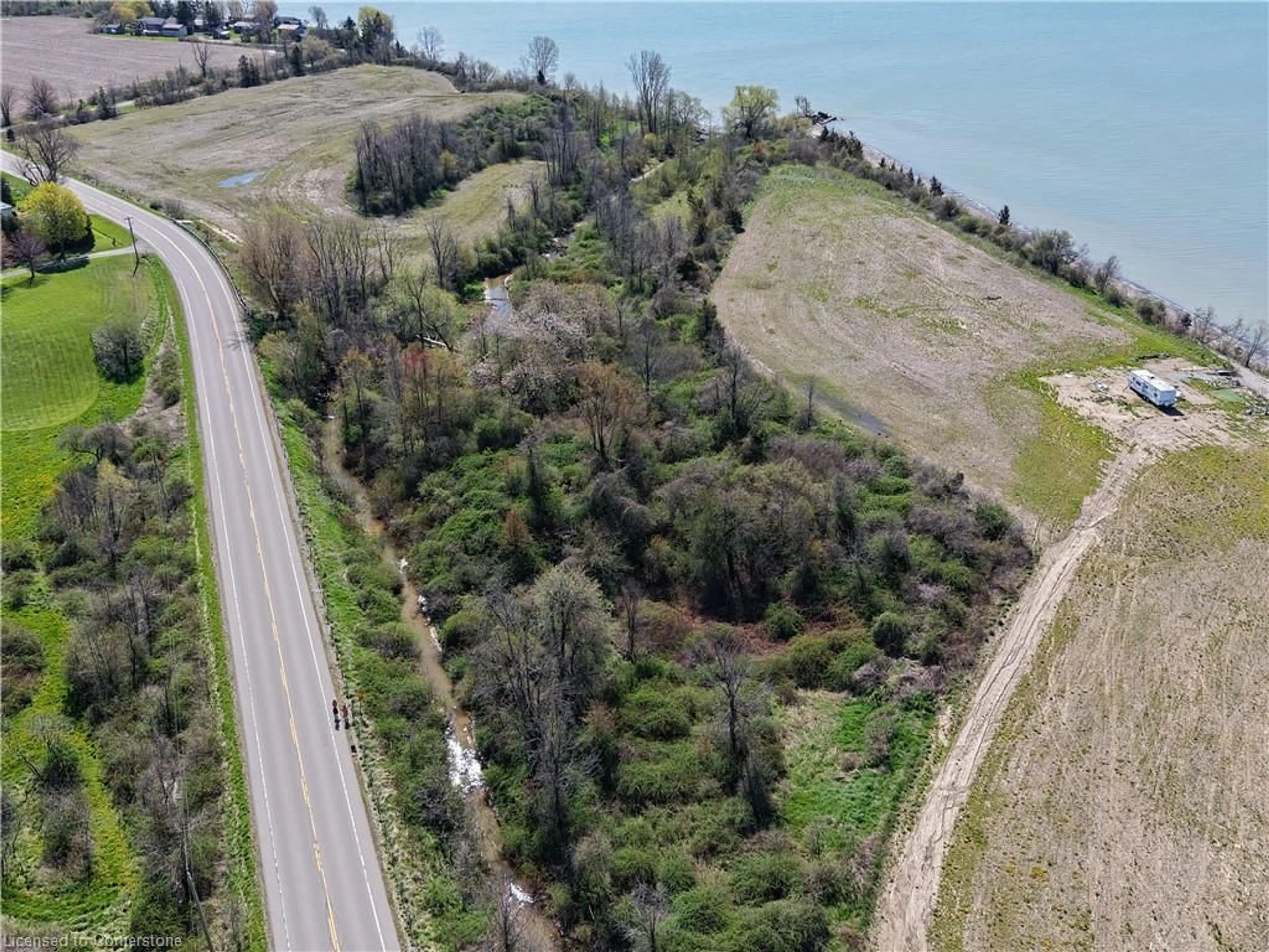 A pic from outside/outdoor area/front of a property/back of a property/a pic from drone, water/lake/river/ocean view for LAKESHORE N/A Rd, Port Rowan Ontario N0E 1M0