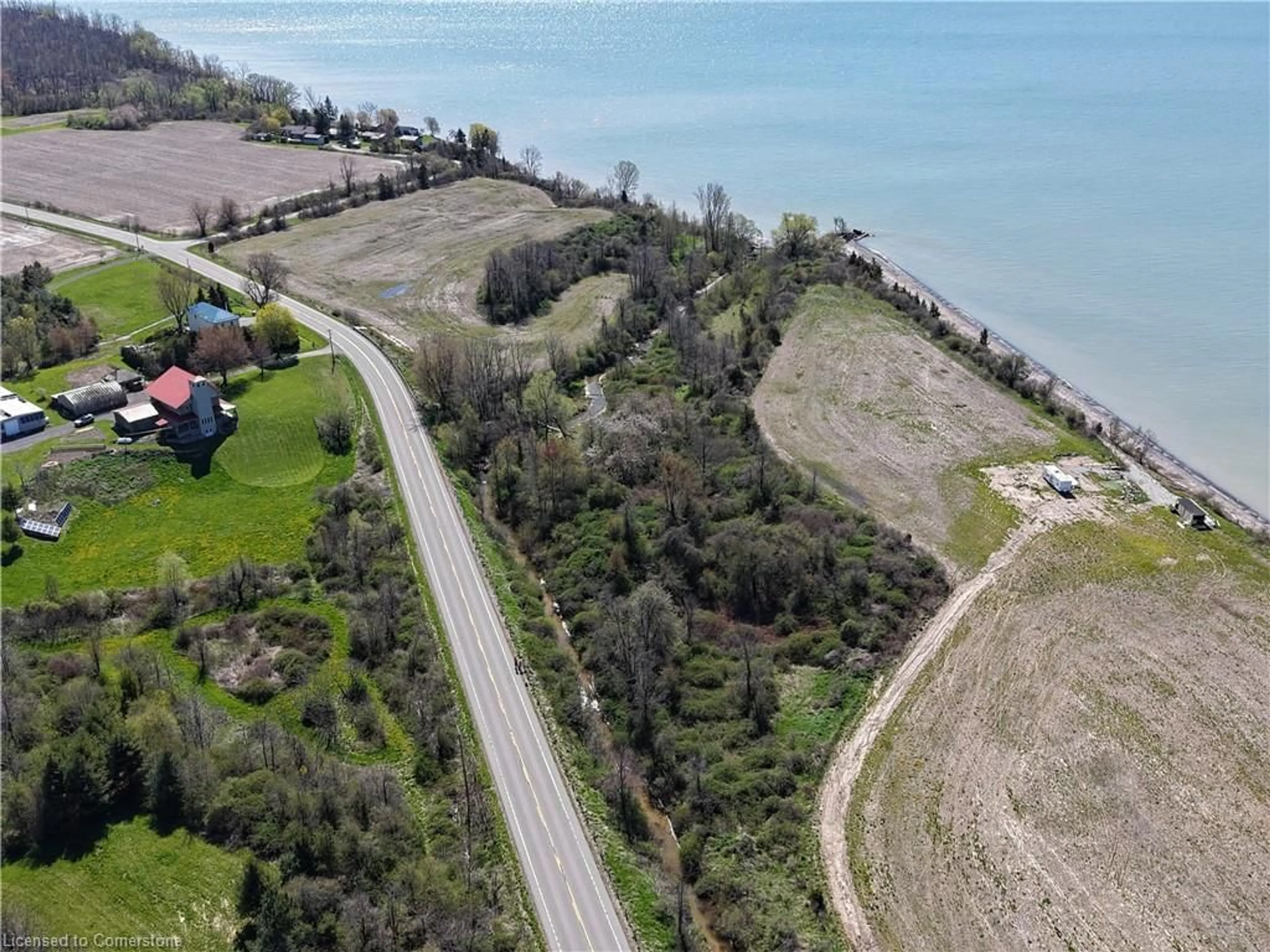 A pic from outside/outdoor area/front of a property/back of a property/a pic from drone, water/lake/river/ocean view for LAKESHORE N/A Rd, Port Rowan Ontario N0E 1M0