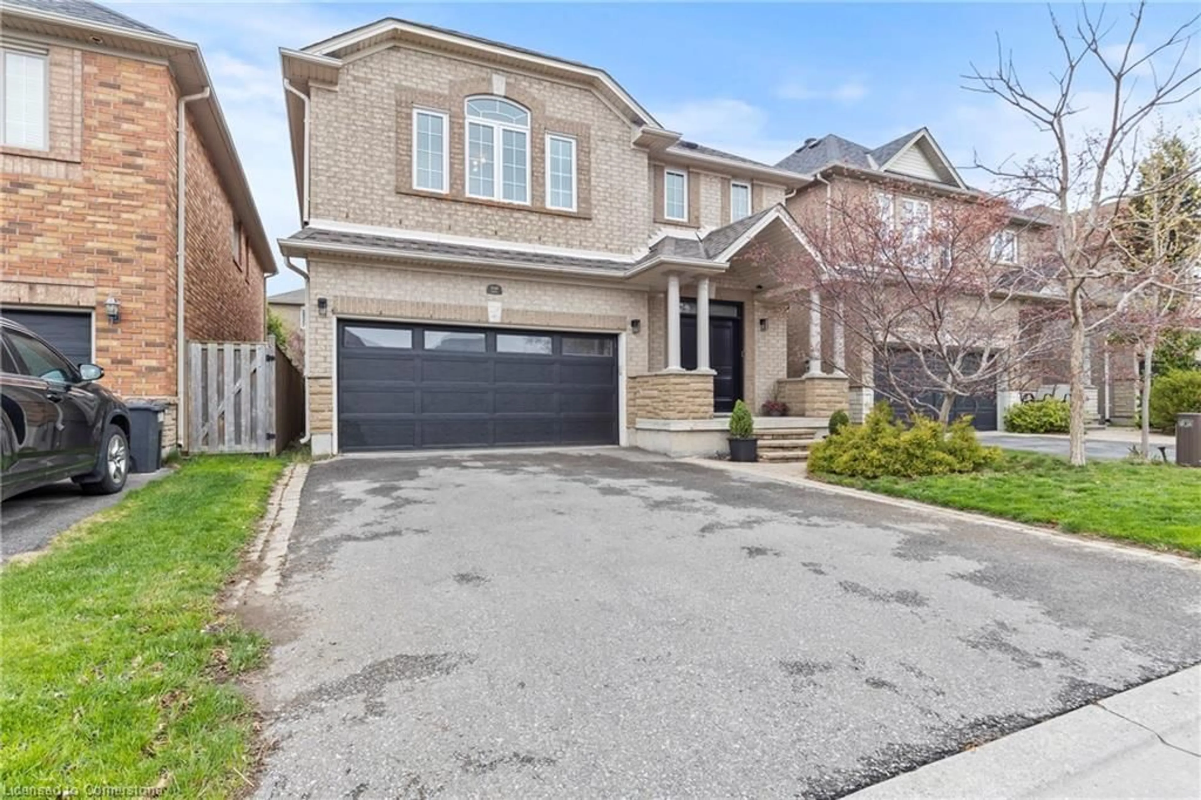 Home with brick exterior material, street for 2240 Osprey Lane, Oakville Ontario L6M 3Z8
