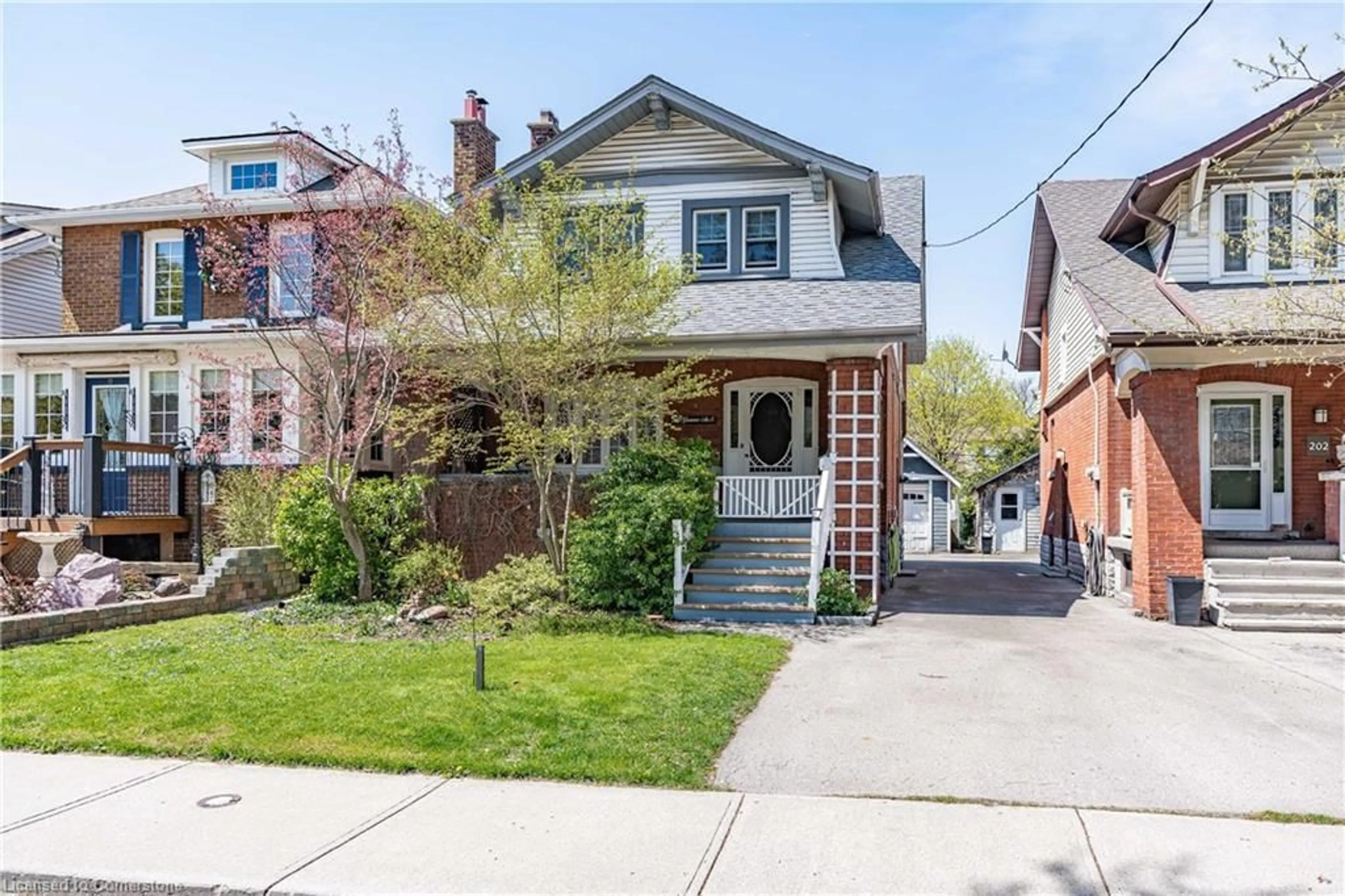 Home with brick exterior material, street for 206 Grosvenor Ave, Hamilton Ontario L8M 3L6