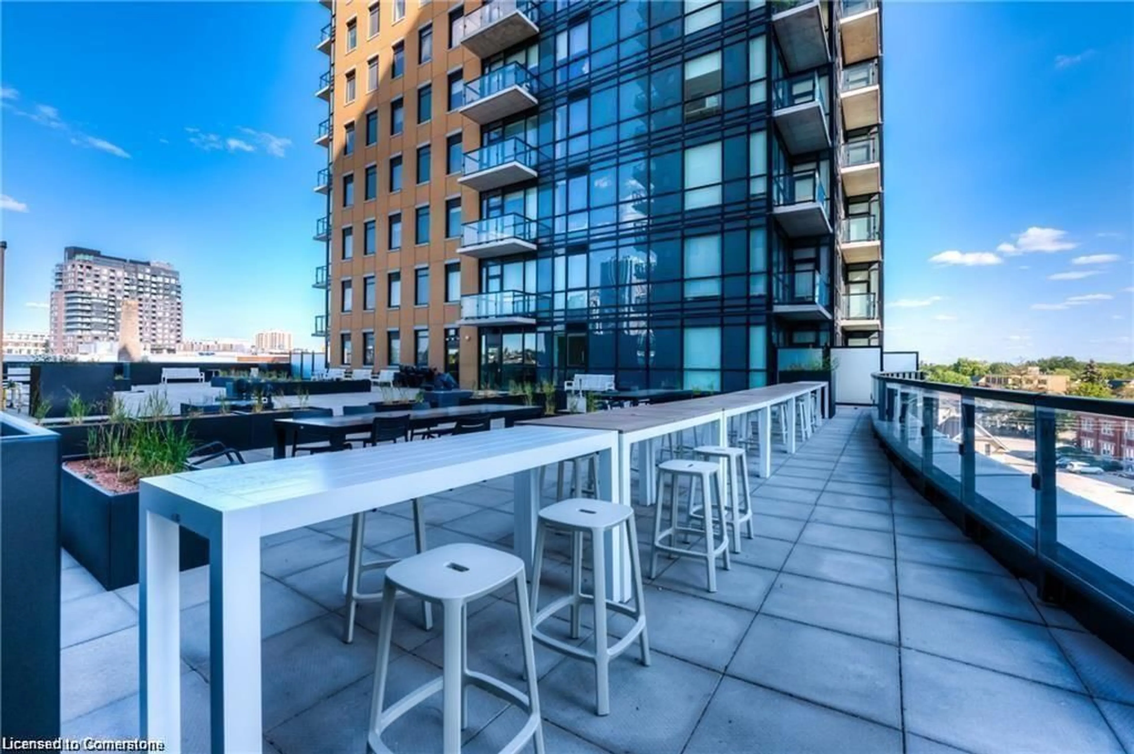 Patio, city buildings view from balcony for 104 Garment St #2106, Kitchener Ontario N2G 0C8