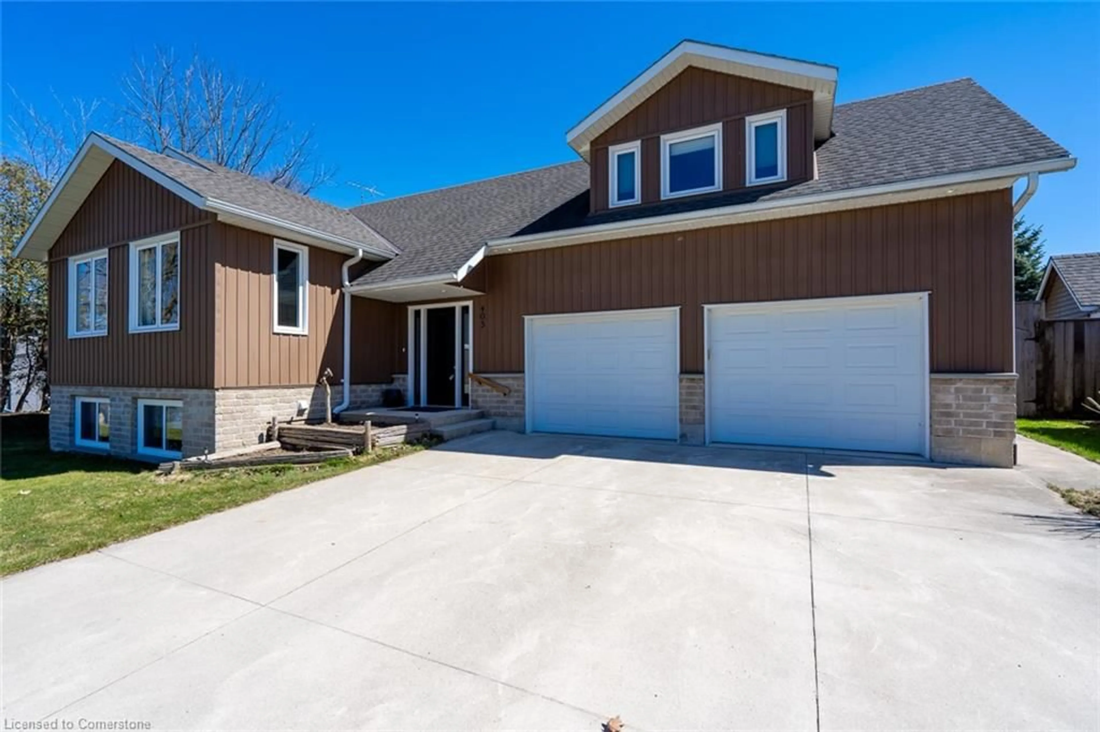 Home with vinyl exterior material, street for 405 Minnie Ave, Wingham Ontario P9A 2P6