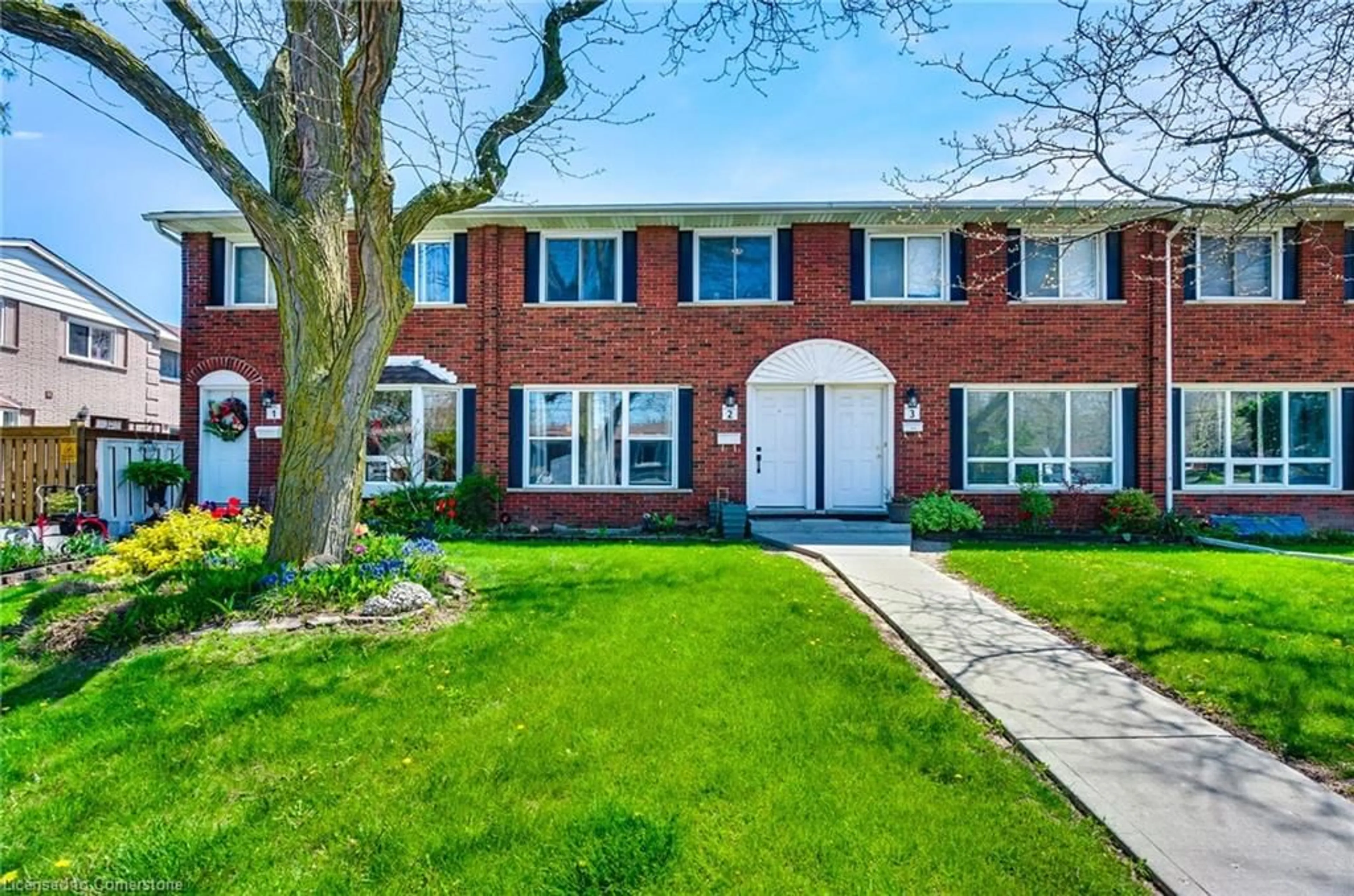 Home with brick exterior material, street for 2700 Barton St #2, Hamilton Ontario L8E 2J7