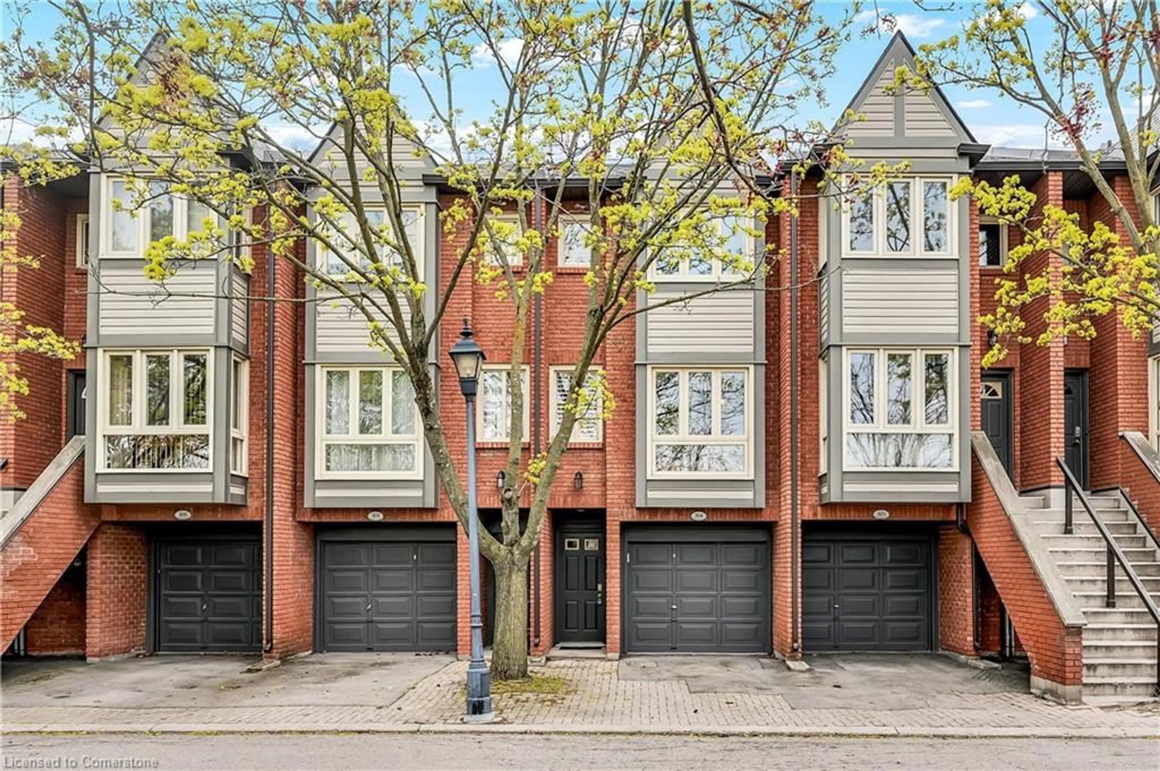 Home with brick exterior material, street for 895 Maple Ave #304, Burlington Ontario L7S 2H7
