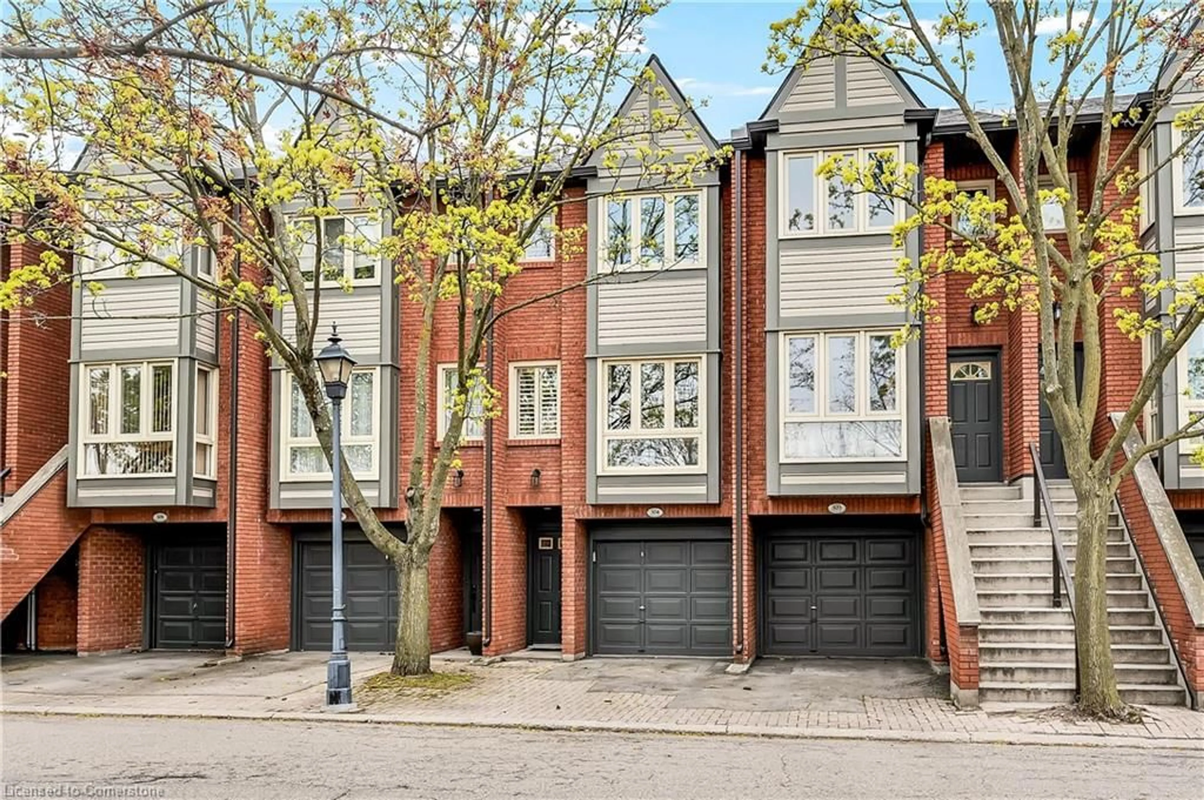 Home with brick exterior material, street for 895 Maple Ave #304, Burlington Ontario L7S 2H7