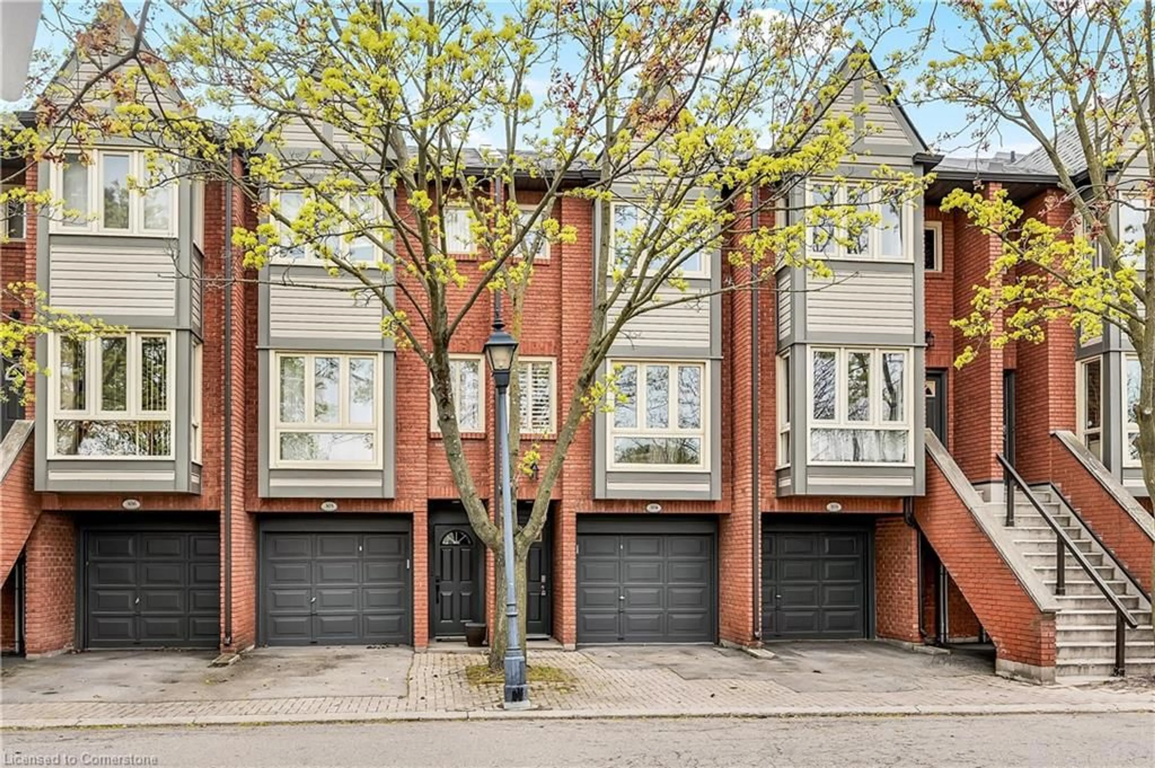 Home with brick exterior material, street for 895 Maple Ave #304, Burlington Ontario L7S 2H7