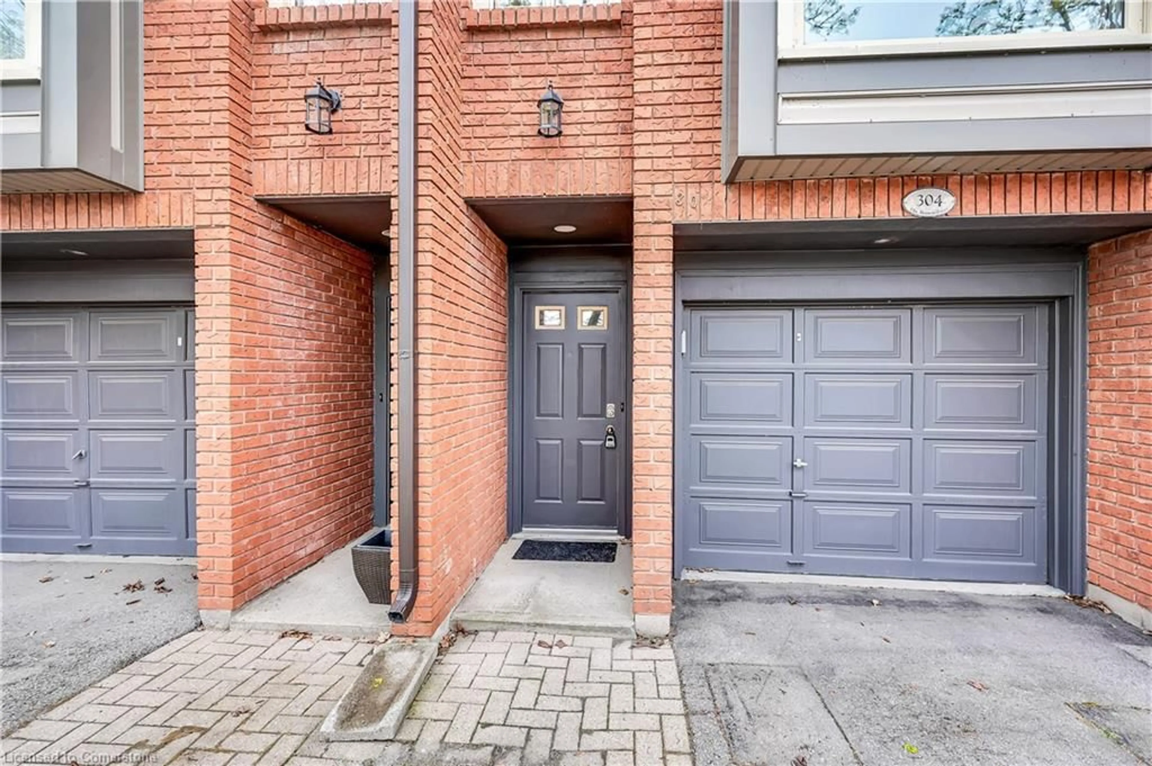 Home with brick exterior material, street for 895 Maple Ave #304, Burlington Ontario L7S 2H7