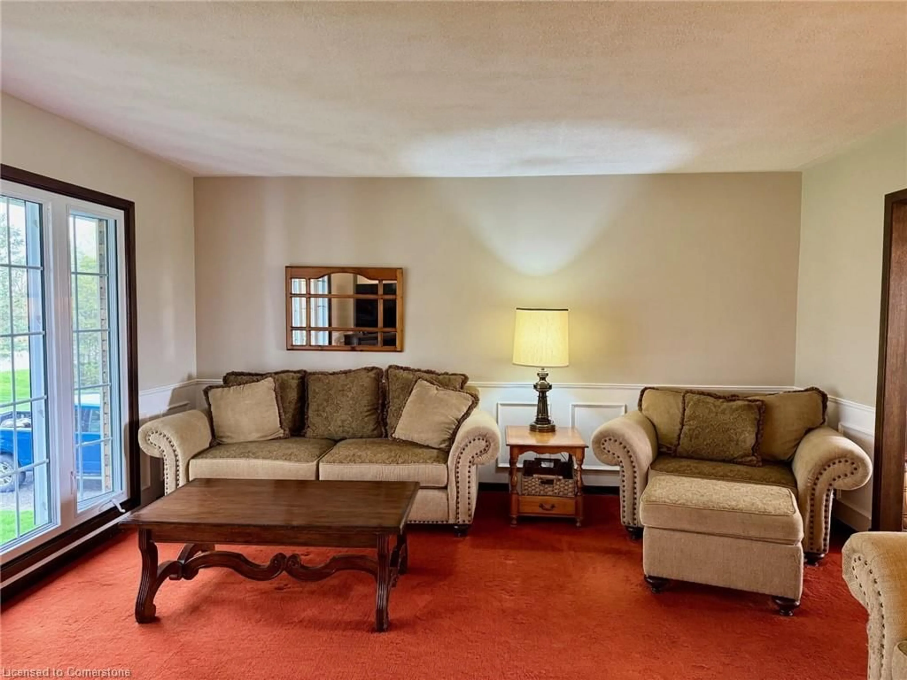 Living room with furniture, carpet floor for 483 Main St, Springford Ontario N0J 1X0