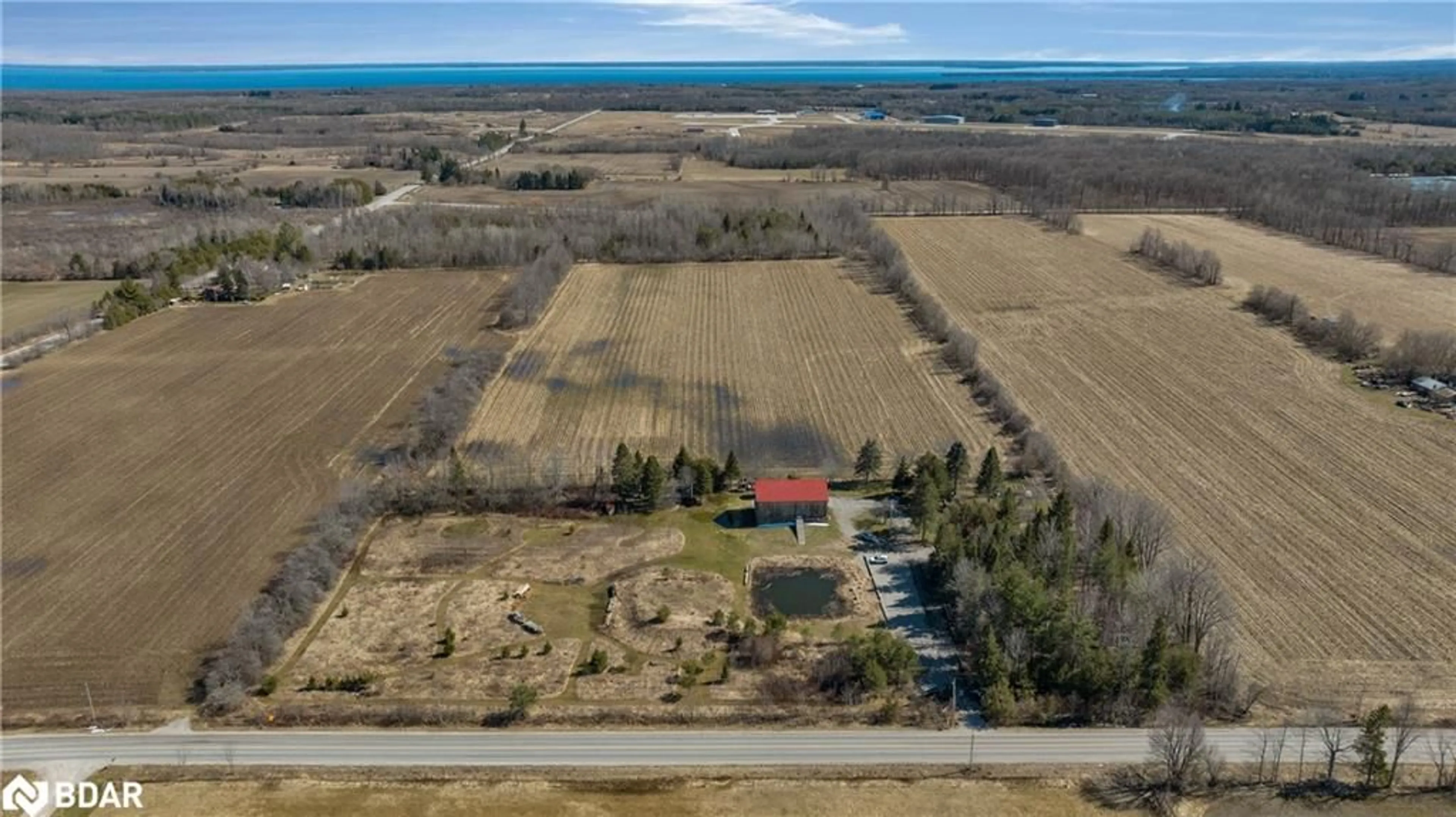 A pic from outside/outdoor area/front of a property/back of a property/a pic from drone, unknown for 73 15/16 Sideroad, Oro-Medonte Ontario L0L 2E0