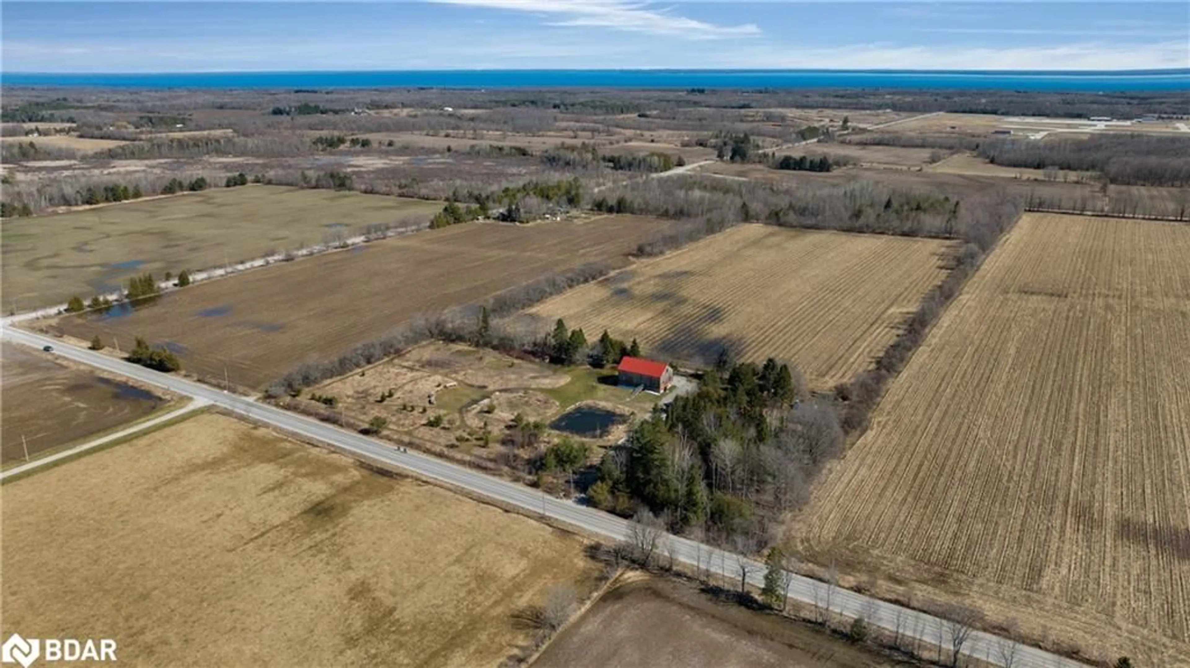 A pic from outside/outdoor area/front of a property/back of a property/a pic from drone, water/lake/river/ocean view for 73 15/16 Sideroad, Oro-Medonte Ontario L0L 2E0