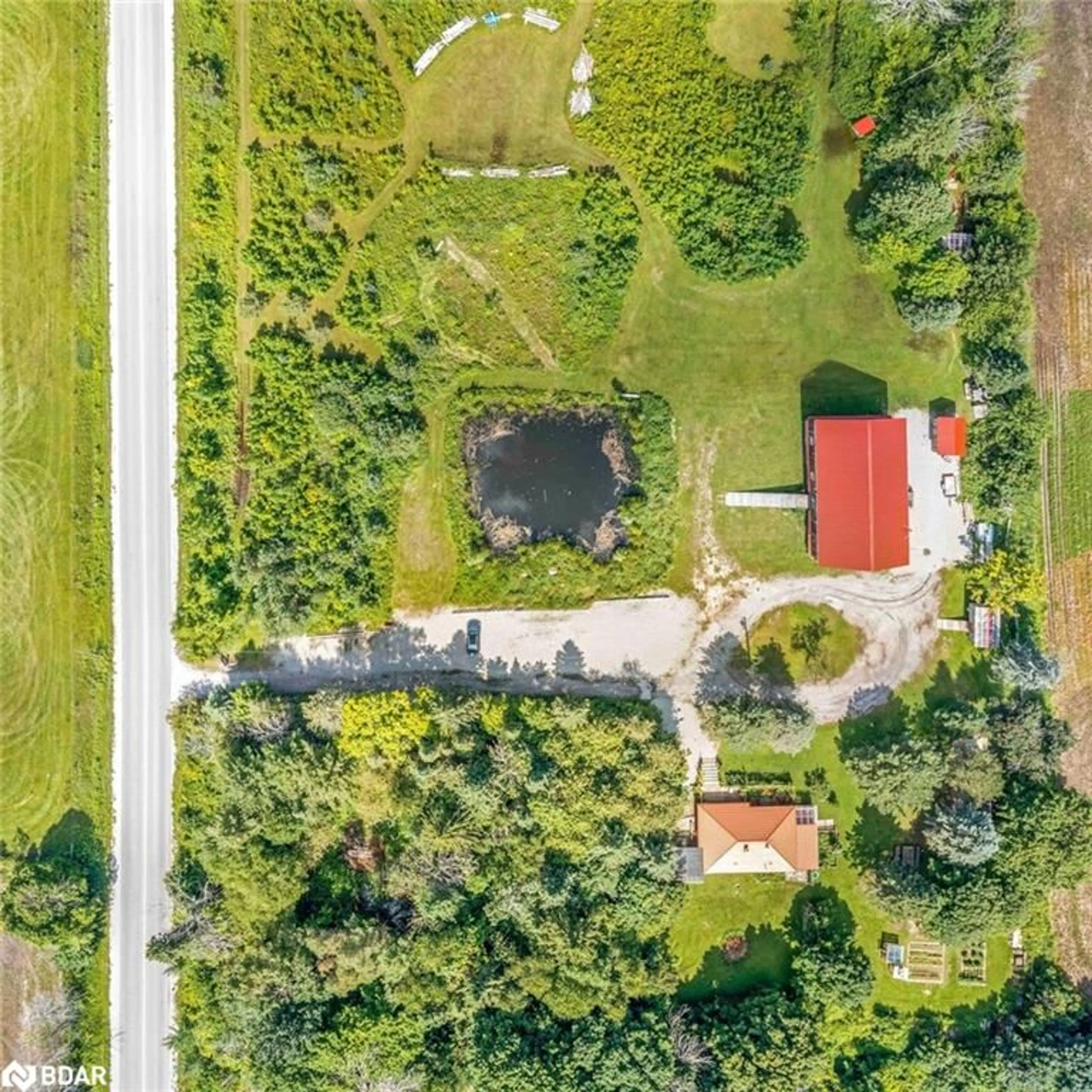 A pic from outside/outdoor area/front of a property/back of a property/a pic from drone, street for 73 15/16 Sideroad, Oro-Medonte Ontario L0L 2E0