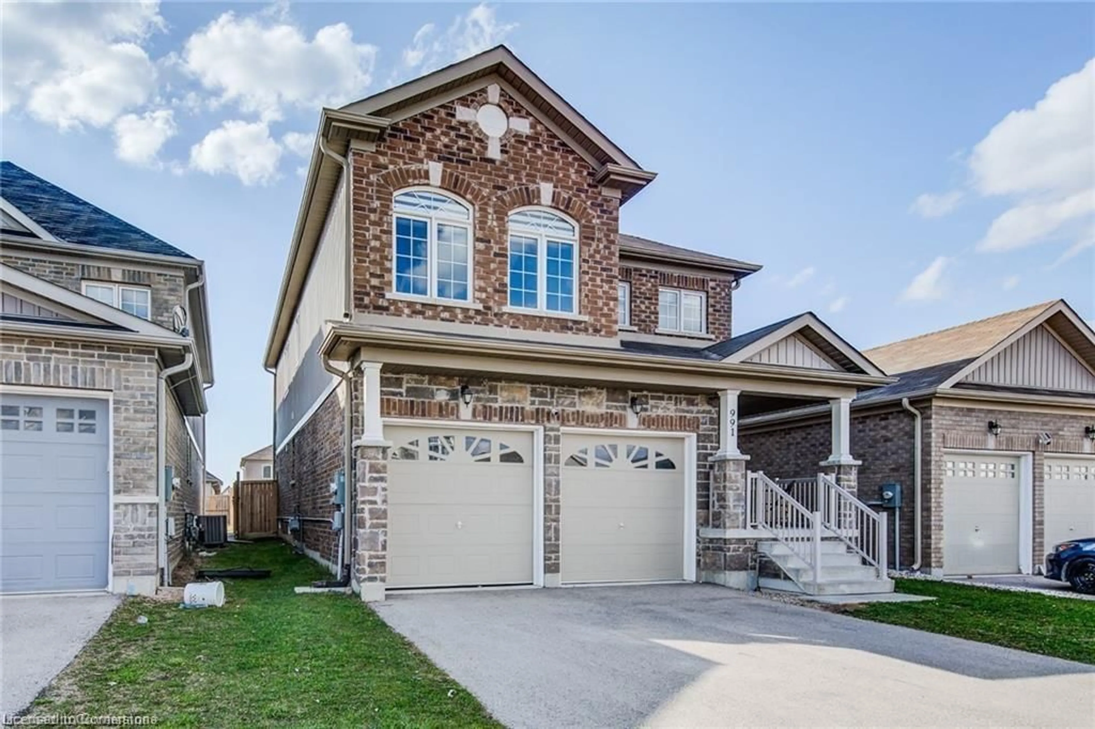 Home with brick exterior material, street for 991 Hannah Ave, Listowel Ontario N4W 0H6