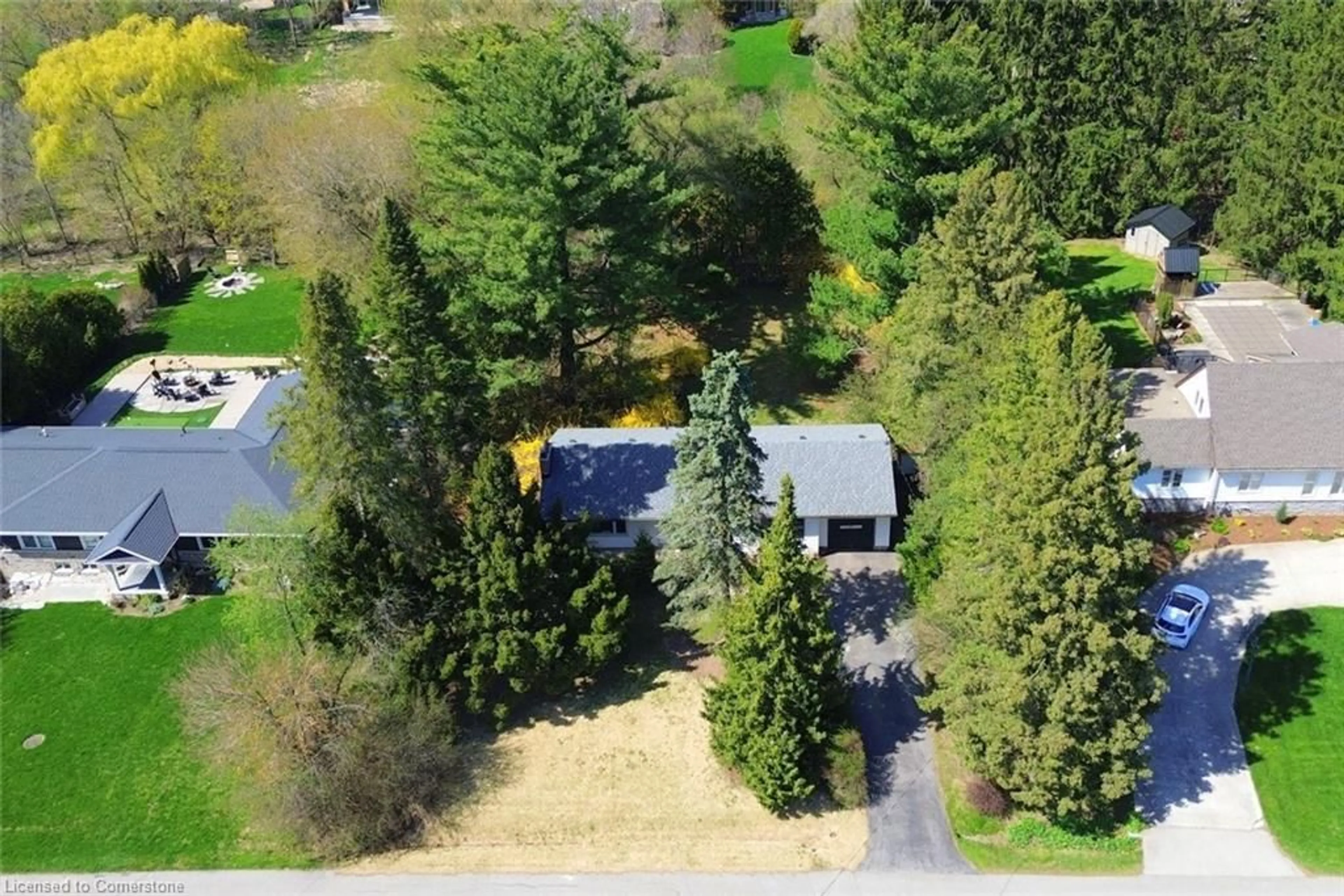 A pic from outside/outdoor area/front of a property/back of a property/a pic from drone, forest/trees view for 37 Webster St, Greensville Ontario L9H 4Z5