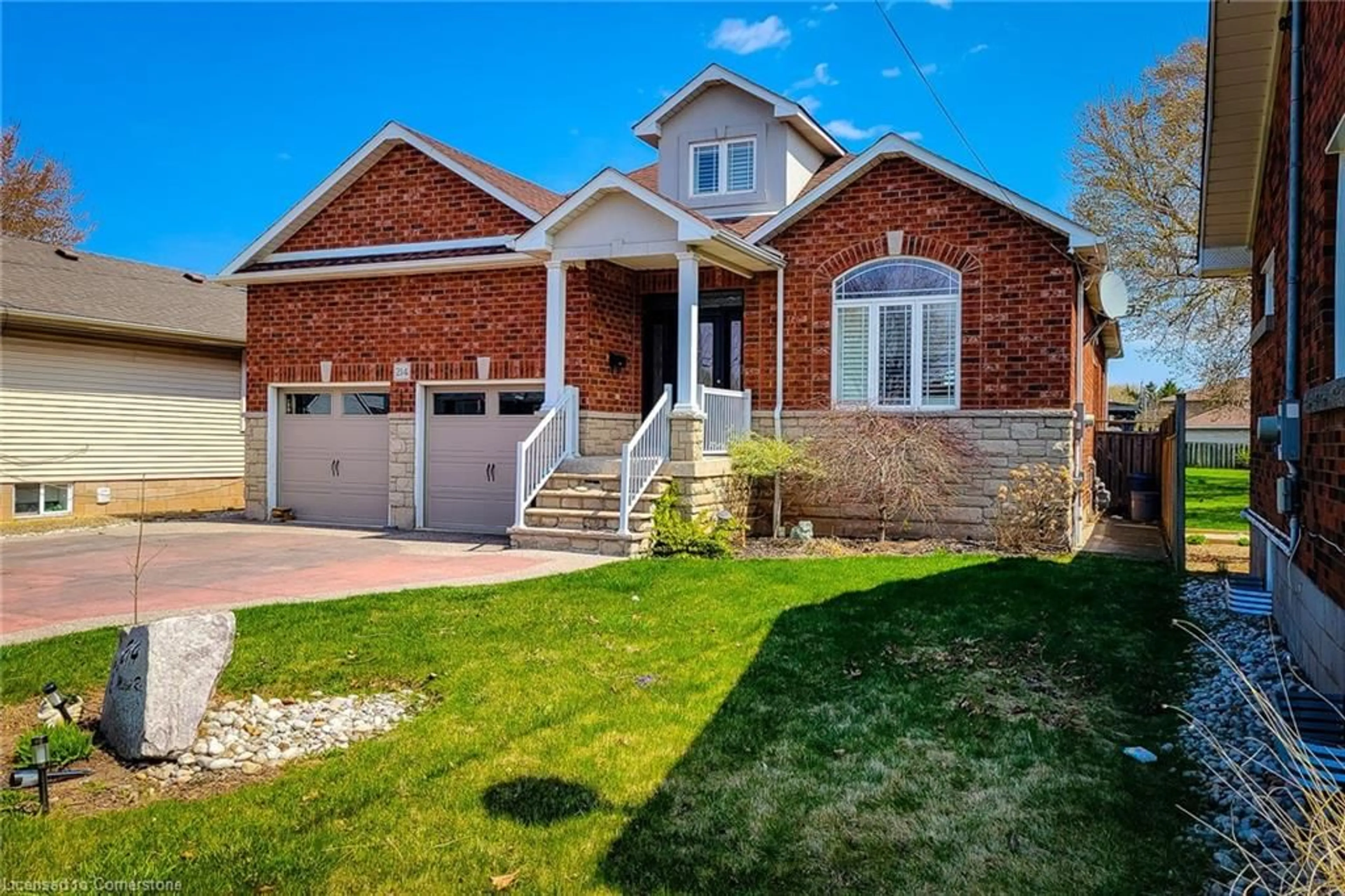 Home with brick exterior material, street for 214 Millen Rd, Stoney Creek Ontario L8E 2G7