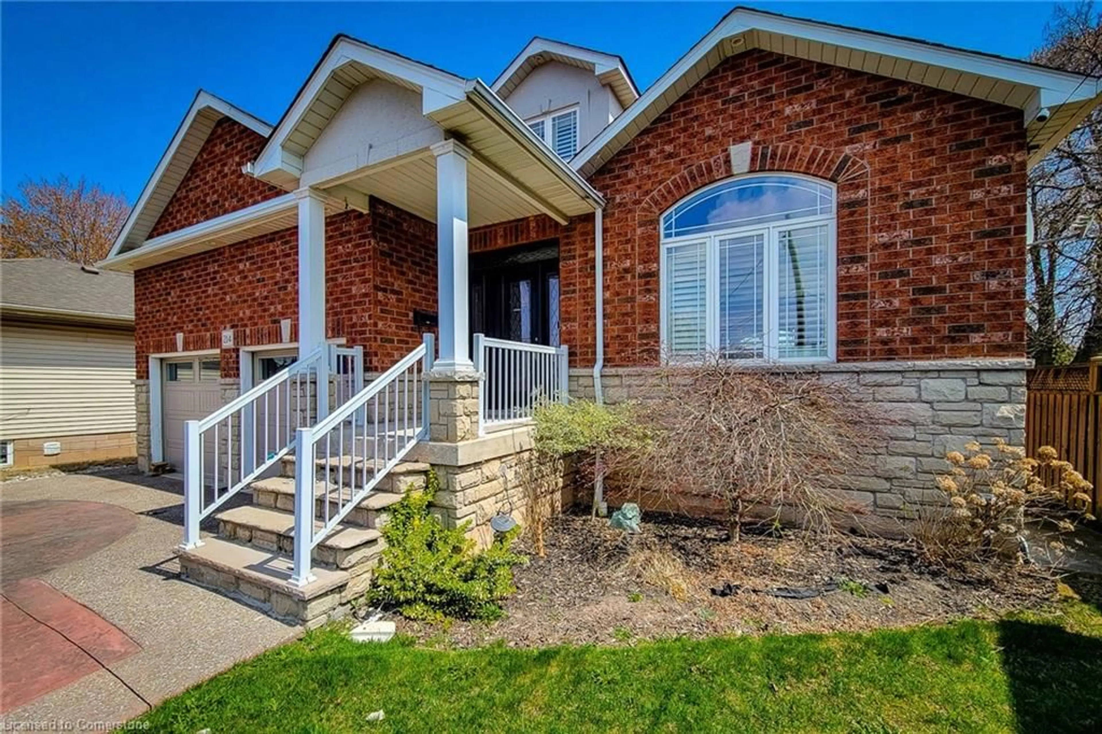 Home with brick exterior material, street for 214 Millen Rd, Stoney Creek Ontario L8E 2G7