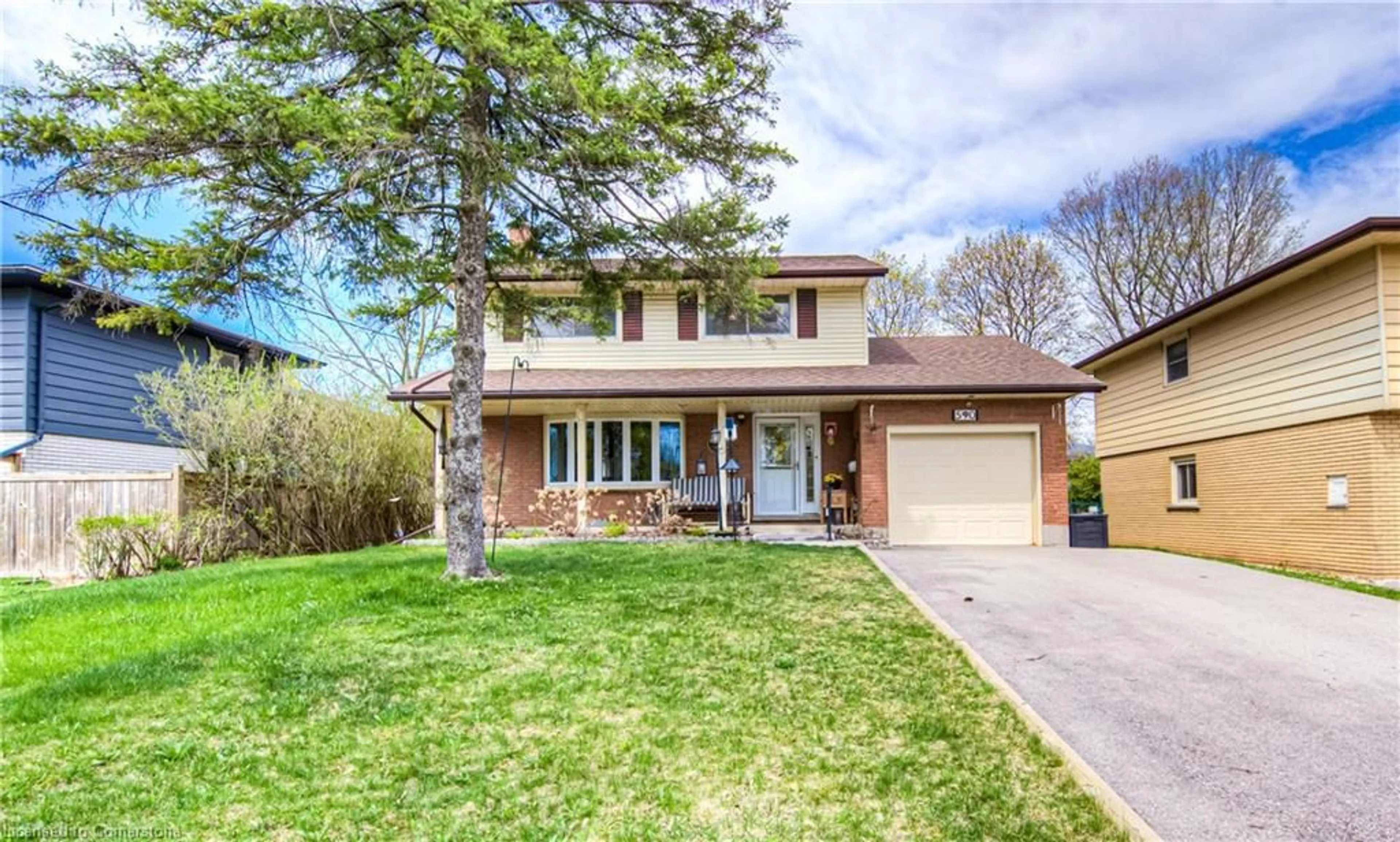 Home with brick exterior material, street for 590 Manchester Rd, Kitchener Ontario N2B 1B3