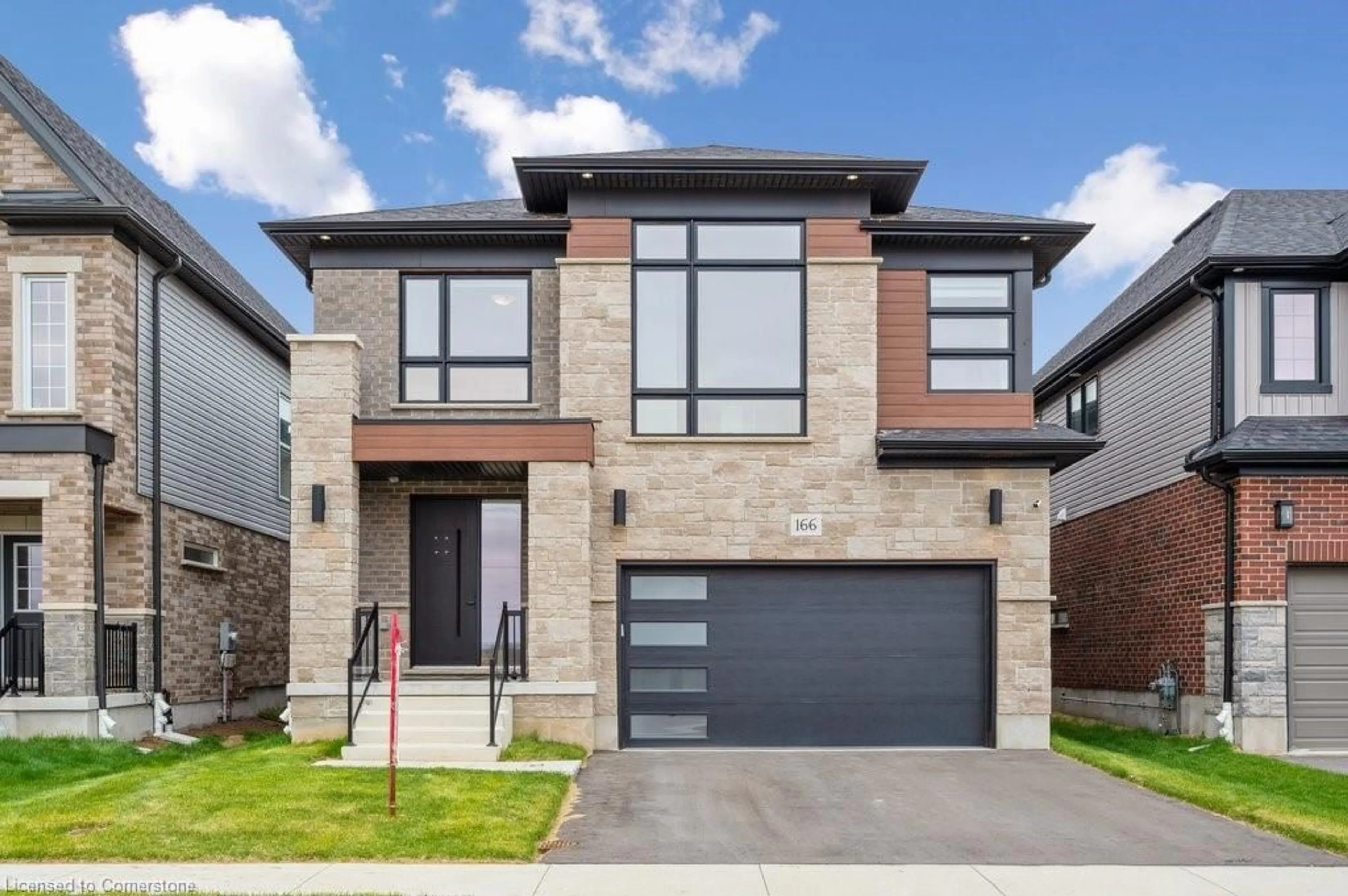Home with brick exterior material, street for 166 Shaded Creek Drive Dr, Kitchener Ontario N2P 0K7