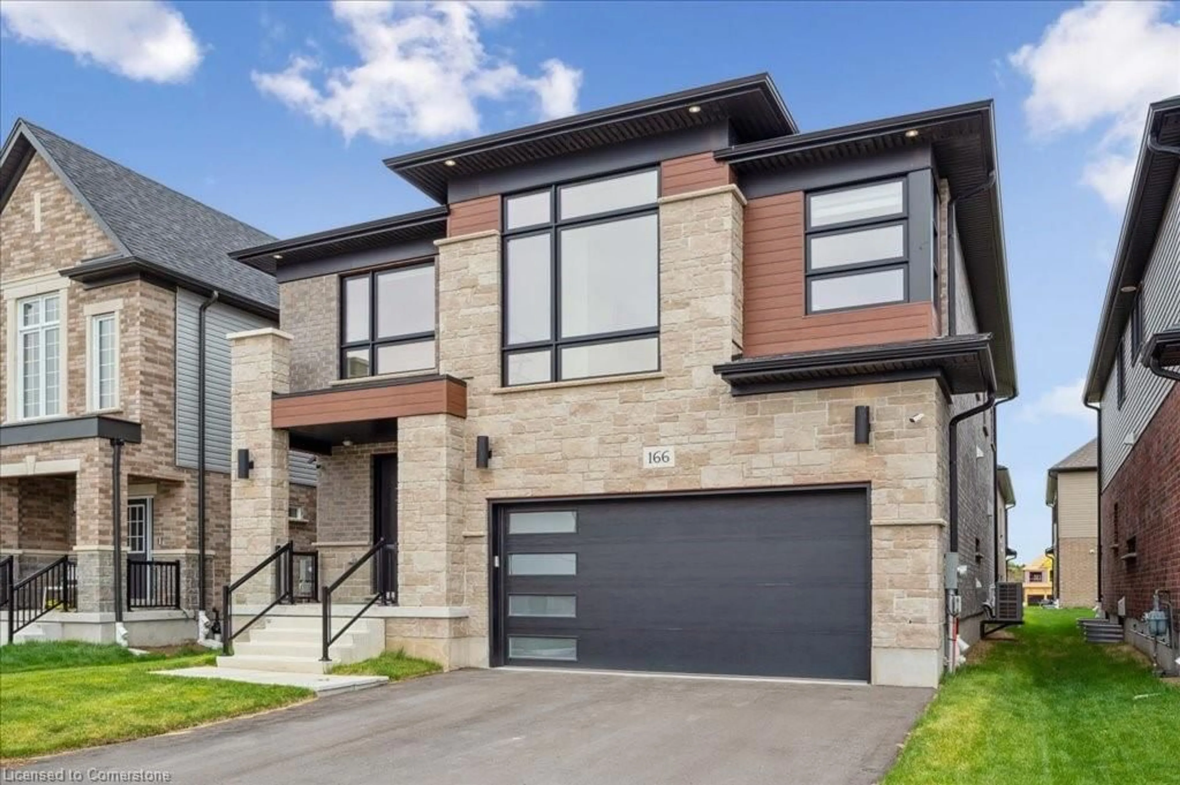Home with brick exterior material, street for 166 Shaded Creek Drive Dr, Kitchener Ontario N2P 0K7