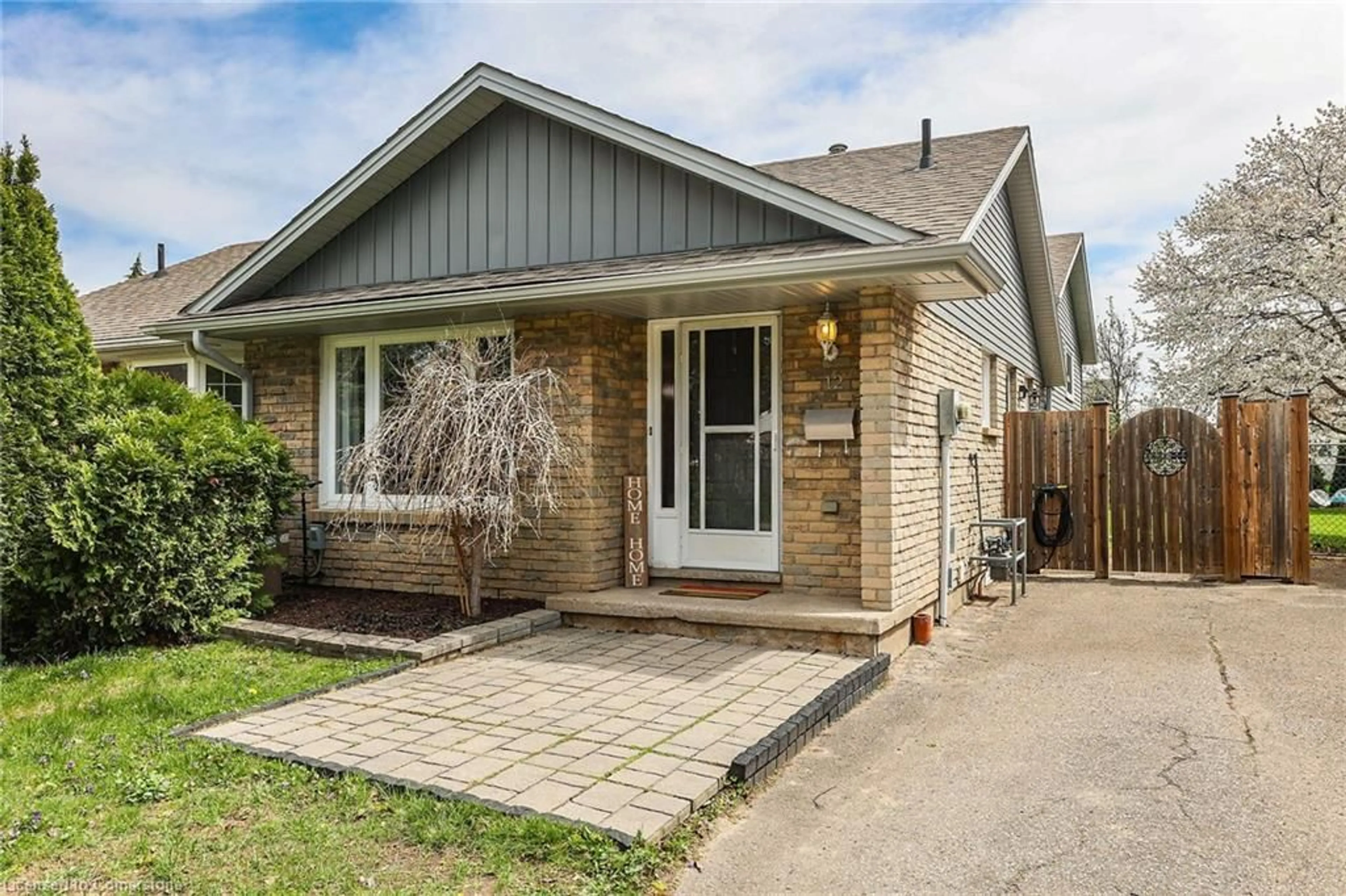Home with brick exterior material, street for 12 Mcnicholl Cir, St. Catharines Ontario L2N 7C5