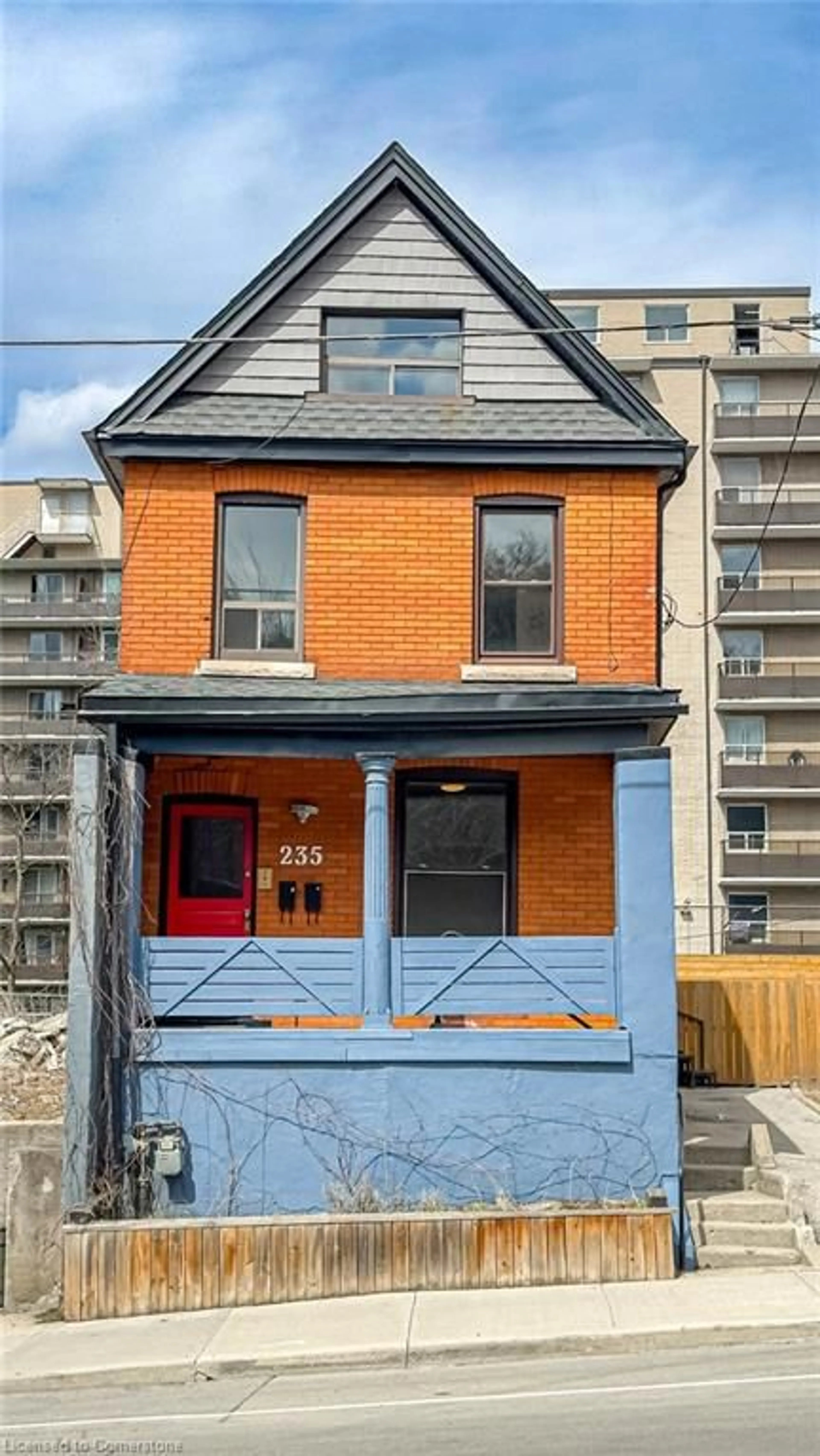 Home with brick exterior material, street for 235 Young St, Hamilton Ontario L8N 1V9