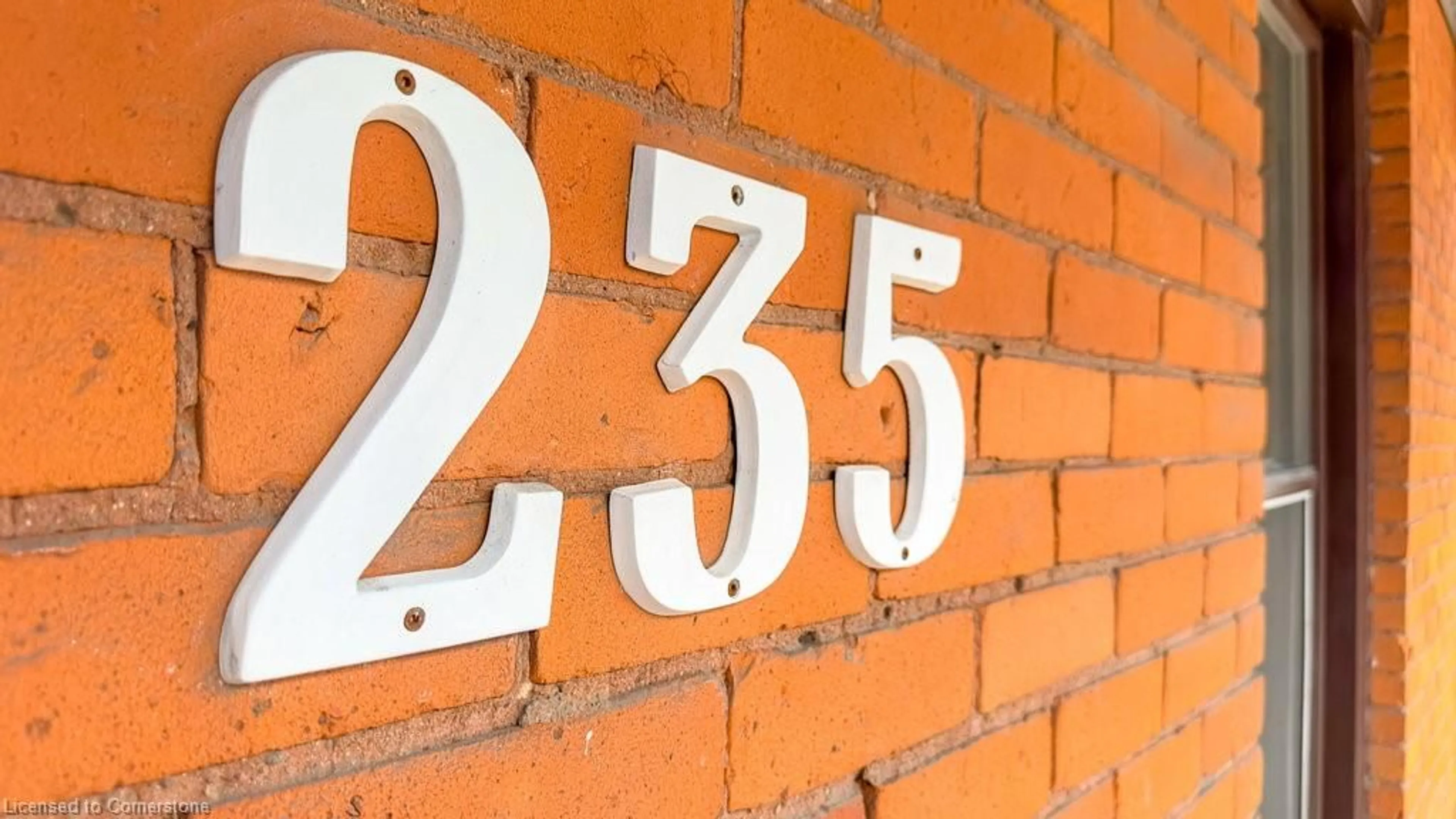 Home with brick exterior material, building for 235 Young St, Hamilton Ontario L8N 1V9