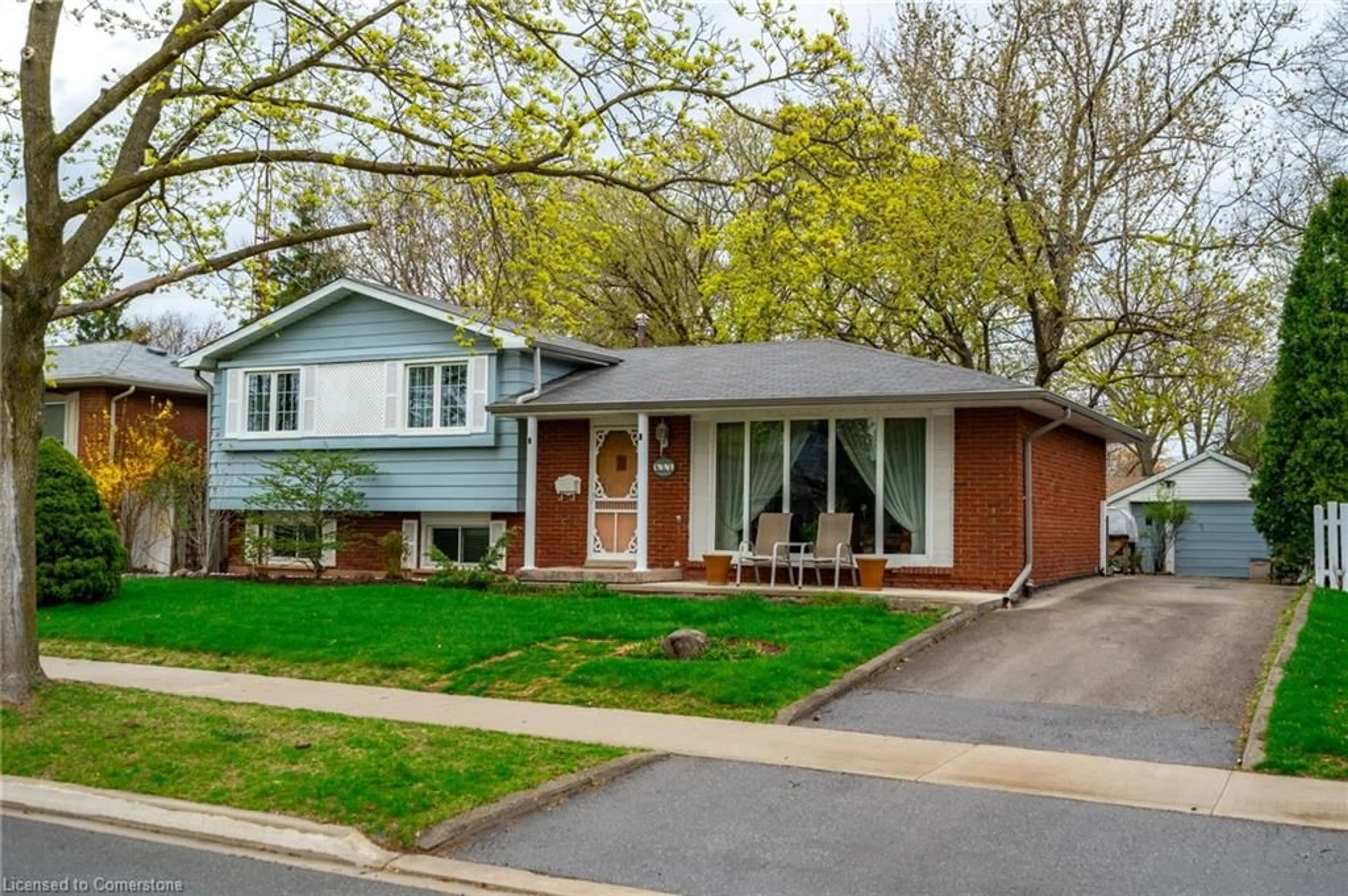 Home with brick exterior material, street for 611 Woodview Rd, Burlington Ontario L7M 3V2
