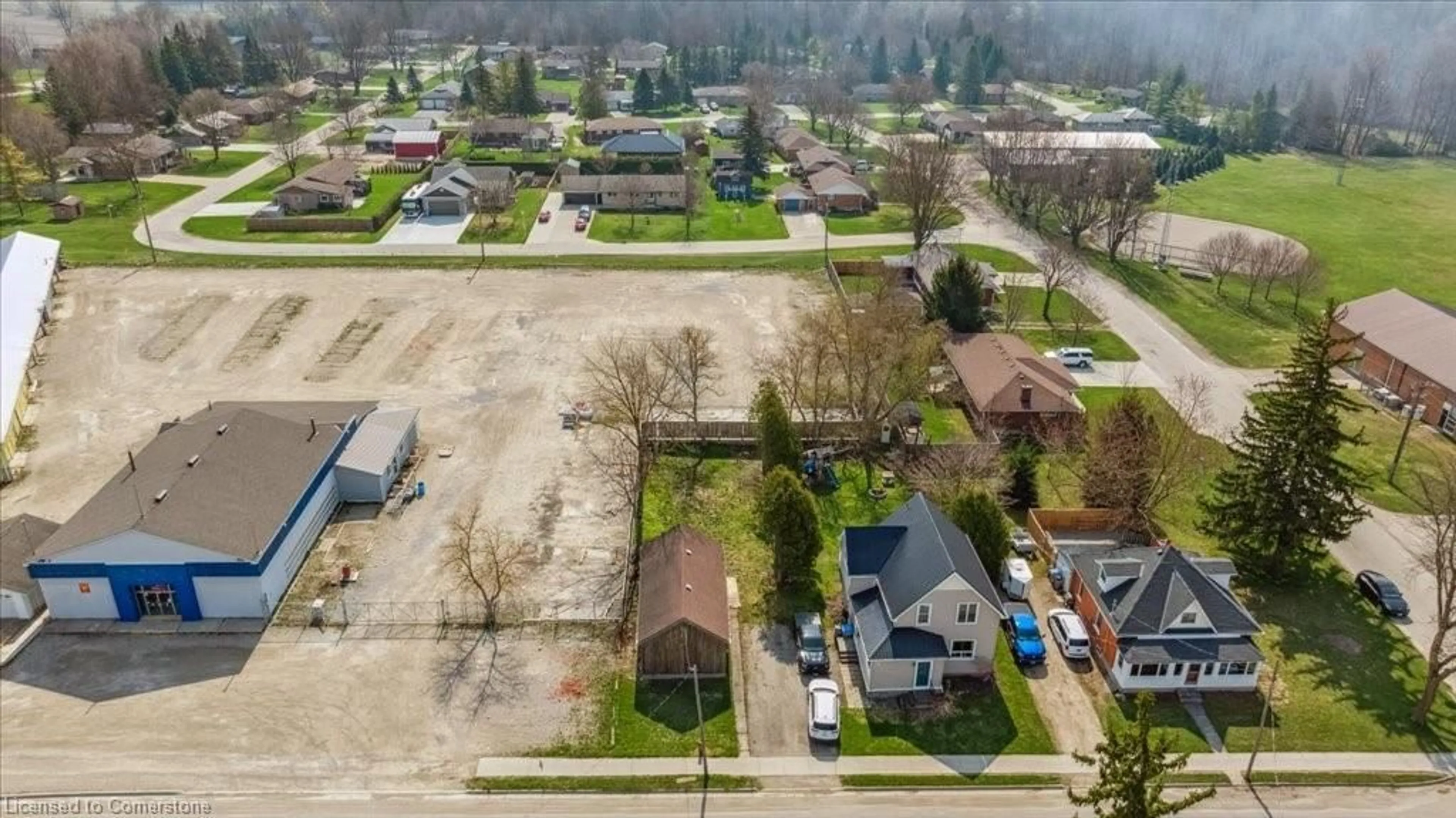 A pic from outside/outdoor area/front of a property/back of a property/a pic from drone, street for 239 Main St, Atwood Ontario N0G 1B0