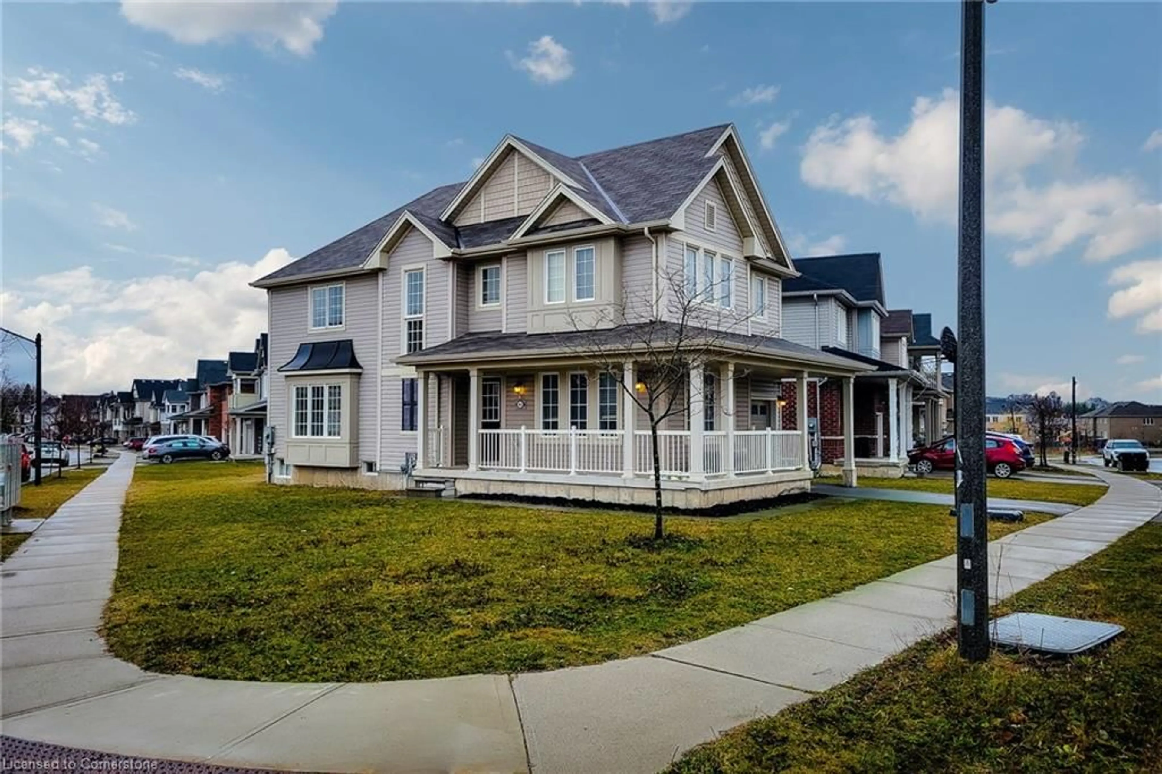 Home with vinyl exterior material, street for 64 Longboat Run, Brantford Ontario N3T 0P8