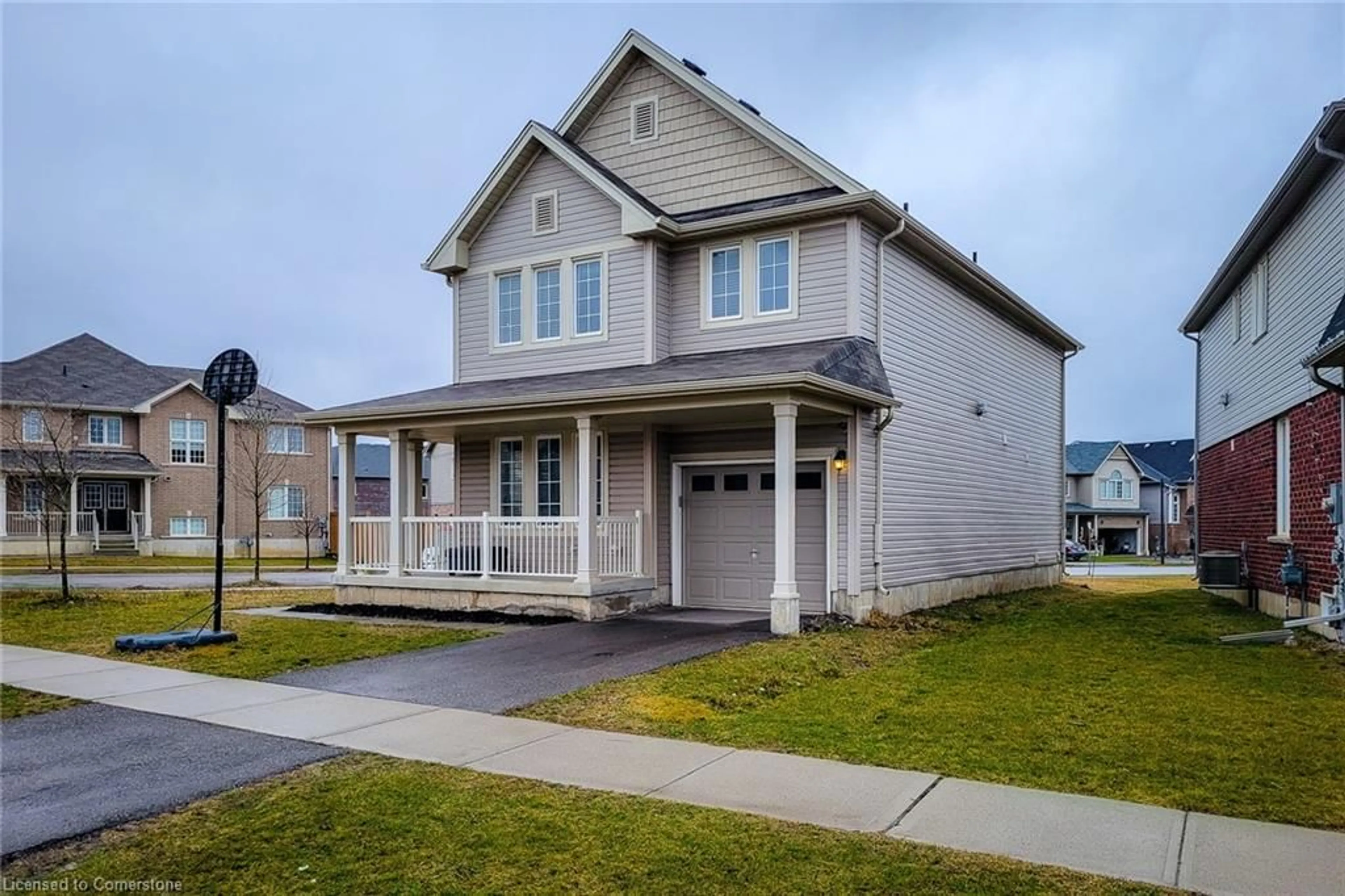 Home with vinyl exterior material, street for 64 Longboat Run, Brantford Ontario N3T 0P8