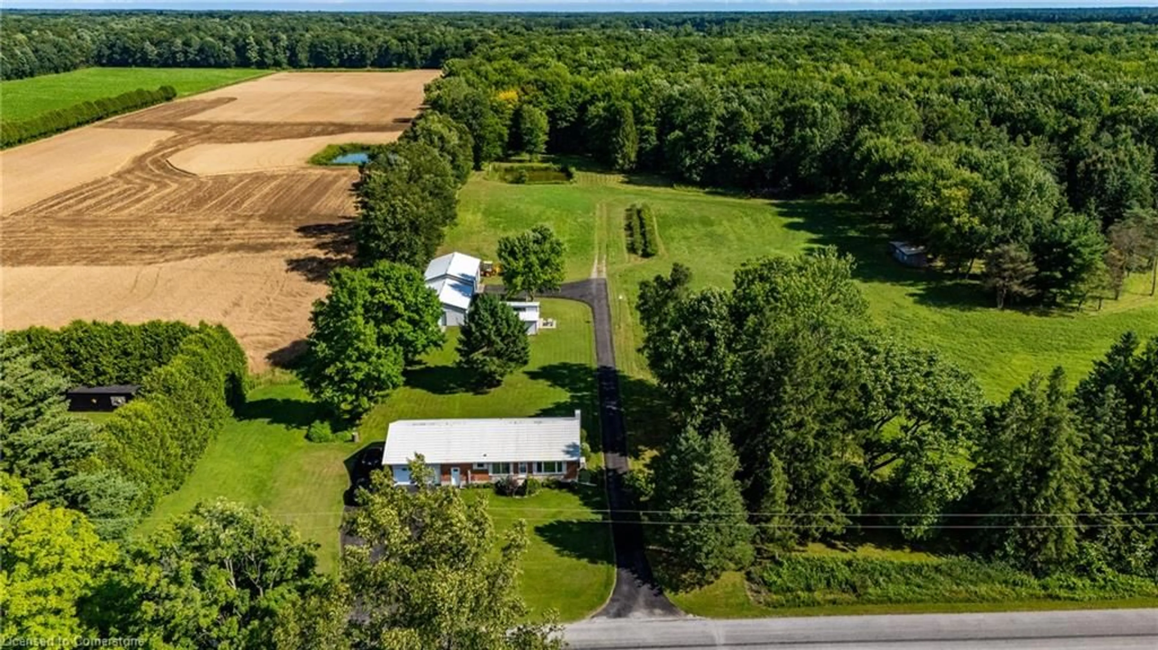 A pic from outside/outdoor area/front of a property/back of a property/a pic from drone, unknown for 360 Charlotteville Road 7, Simcoe Ontario N3Y 4K5