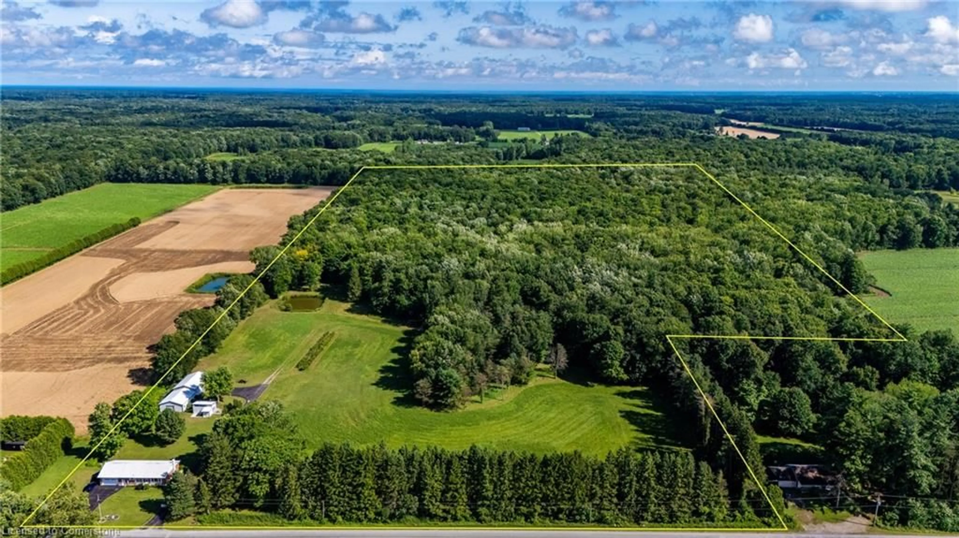 A pic from outside/outdoor area/front of a property/back of a property/a pic from drone, forest/trees view for 360 Charlotteville Road 7, Simcoe Ontario N3Y 4K5